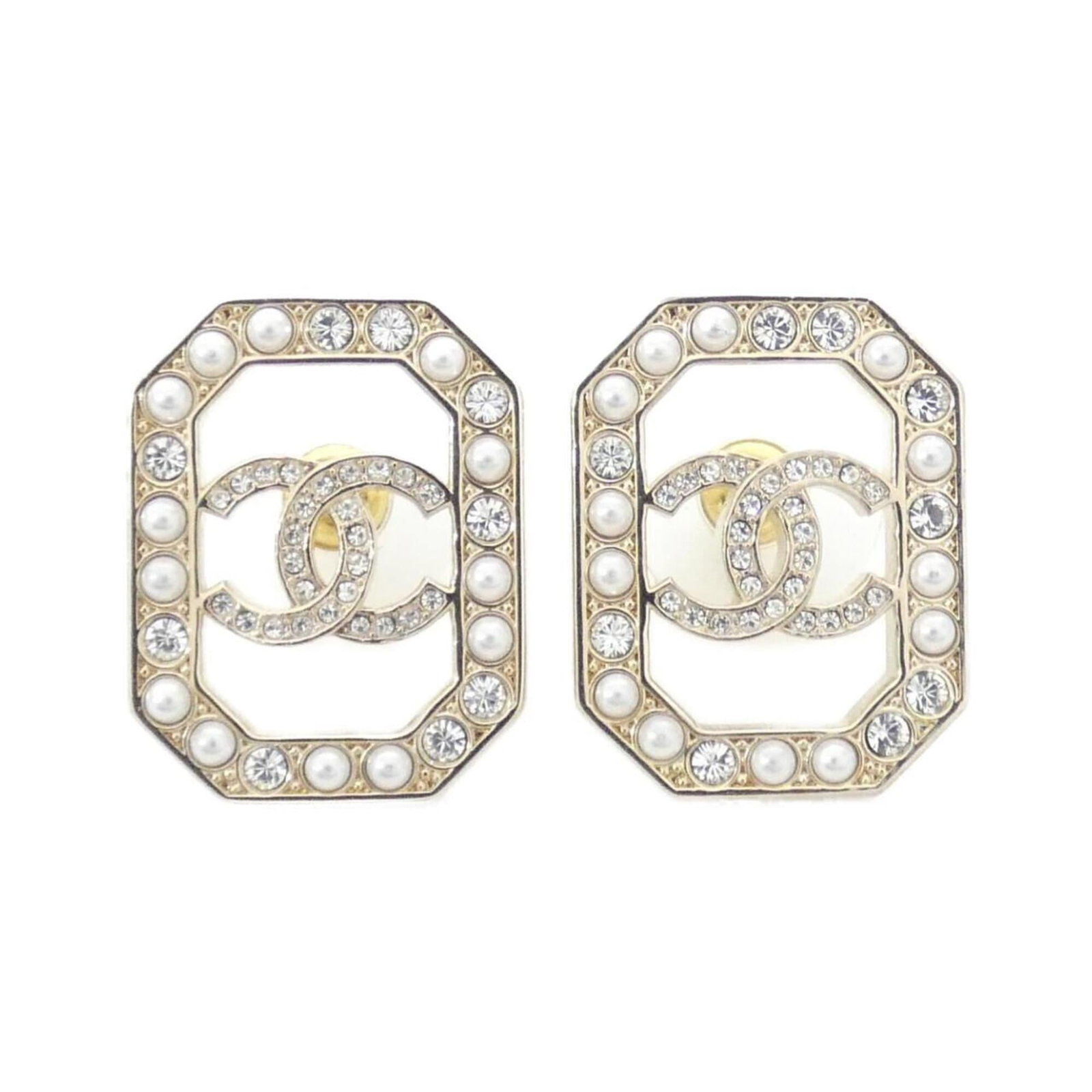 Chanel Stud Earrings: Chanel Stud Earrings Gold stud earrings with artificial pearl and crystal details, measuring 22.00mm x 17.00mm, bearing a signature from the renowned fashion house Chanel. The earrings have been used 