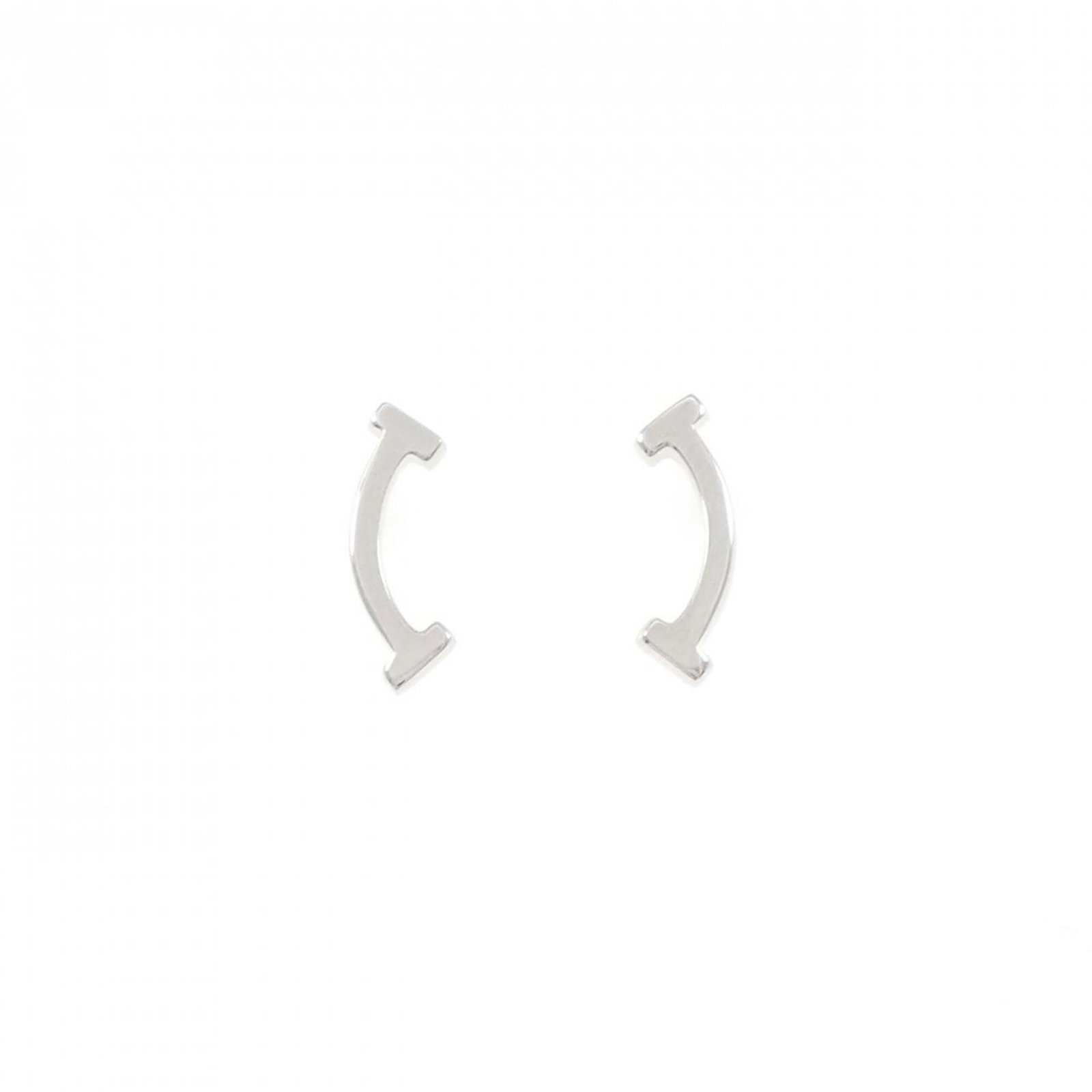 White Gold 18K Tiffany Stud Earrings: White Gold 18K Tiffany Stud Earrings White Gold 18K Tiffany Stud Earrings are crafted from high-quality white gold, offering a touch of luxury to any outfit. With their classic stud design and subtle