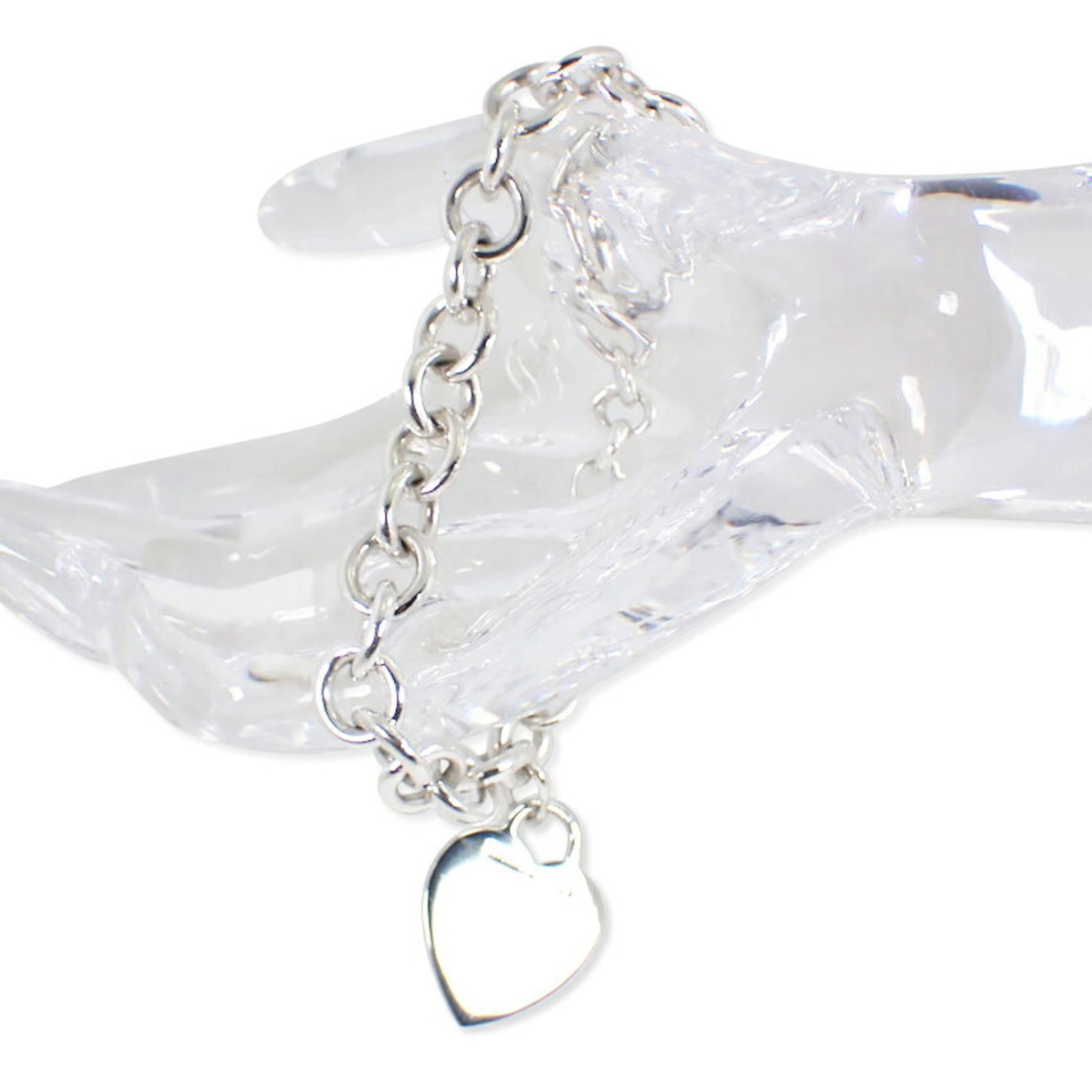 Silver 925 Tiffany Charm Bracelet: Silver 925 Tiffany Charm Bracelet Sterling silver 925 charm bracelet from Tiffany, featuring a subtle shine and elegant design. The 18cm length provides a comfortable fit for everyday wear. With some 