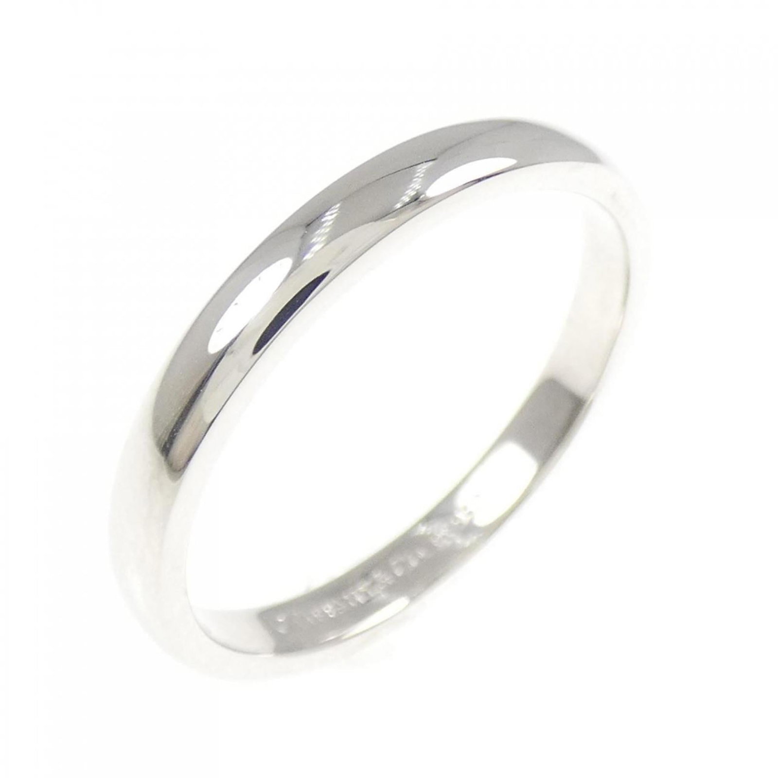 Platinum ring by Tiffany band: Platinum ring by Tiffany band Platinum ring by Tiffany features a sleek band design, crafted from high-quality platinum material. This 950-plated piece boasts a classic style, suitable for everyday we