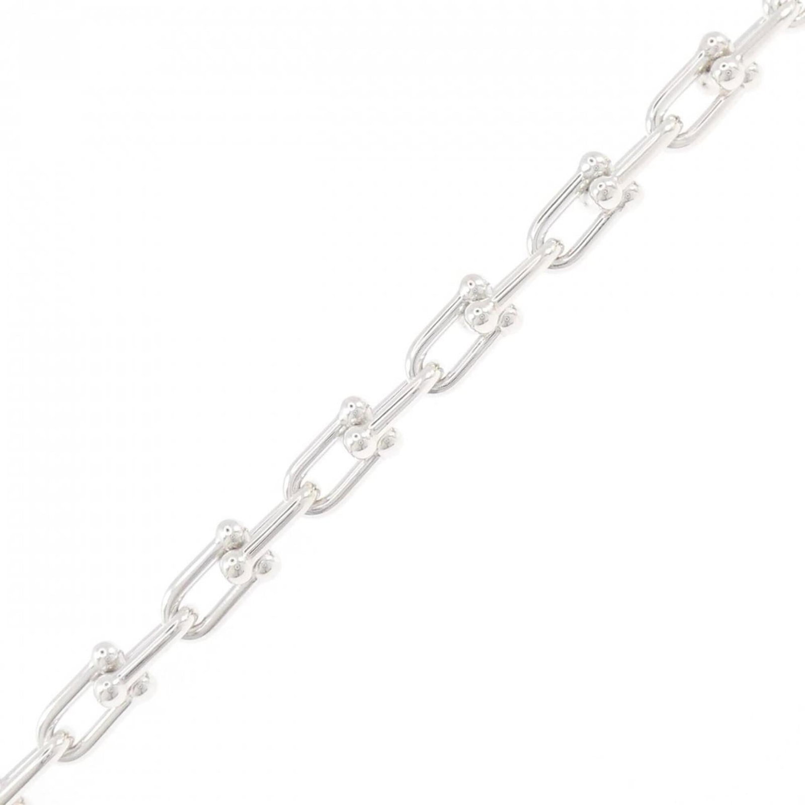 Charm Tiffany Bracelet 925 Silver: Charm Tiffany Bracelet 925 Silver Charm Tiffany Bracelet 925 Silver - A pre-owned, high-quality silver charm bracelet featuring the iconic Tiffany brand, with a length of 18.5cm and made from durable