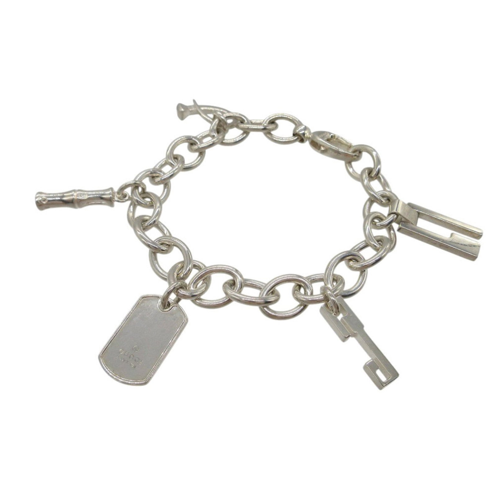 Gucci Charm Bracelet Silver 925: Gucci Charm Bracelet Silver 925 Silver 925 Gucci Charm Bracelet, featuring the iconic Gucci charm design. This silver bracelet measures 18cm in length and showcases a subtle wear, with minor scratches