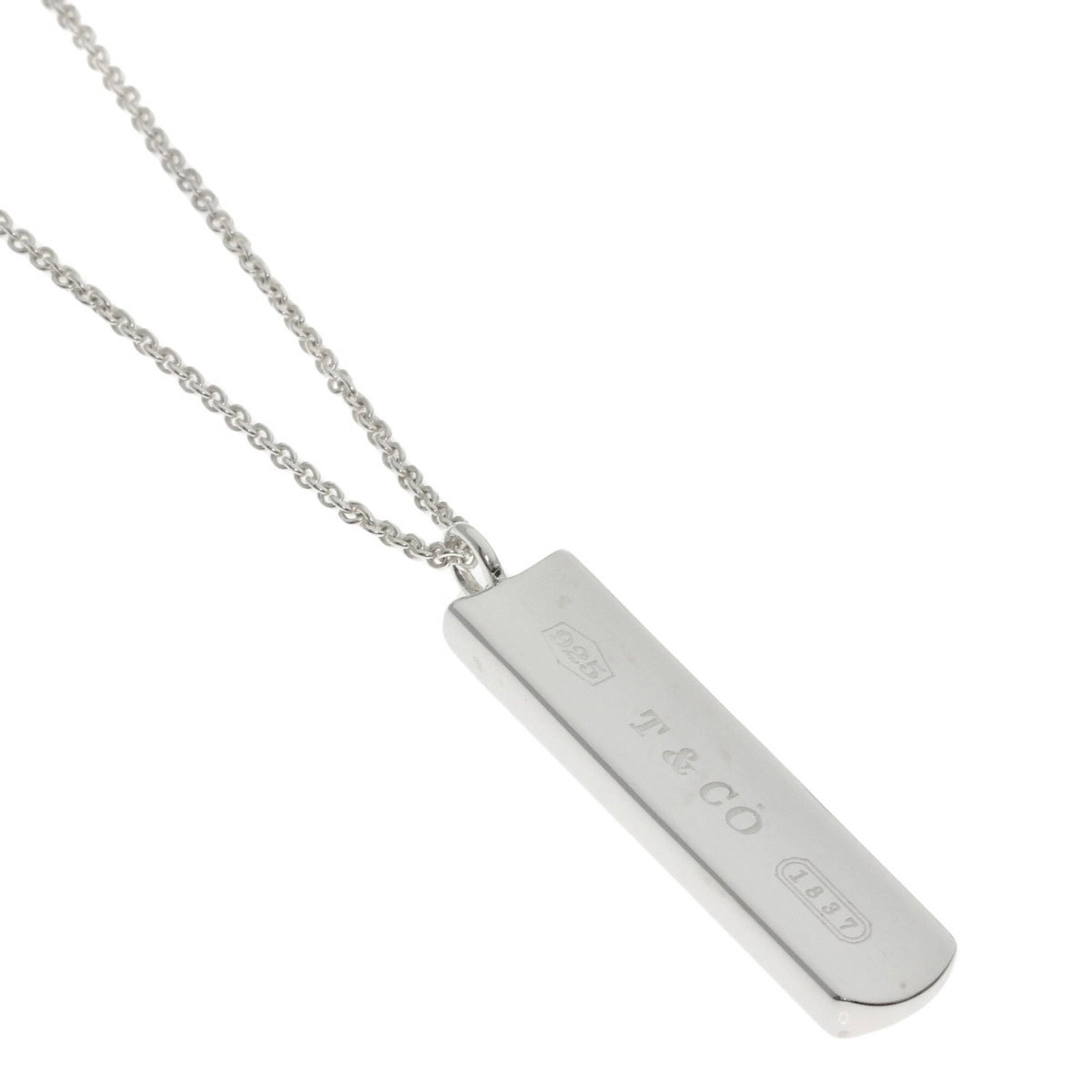 Women's silver necklace bar 1837 from Tiffany: Women's silver necklace bar 1837 from Tiffany Silver necklace bar from Tiffany, dated 1837, bears the hallmark of this iconic luxury brand. The piece features a silver pendant with a sizeable 40.6mm x