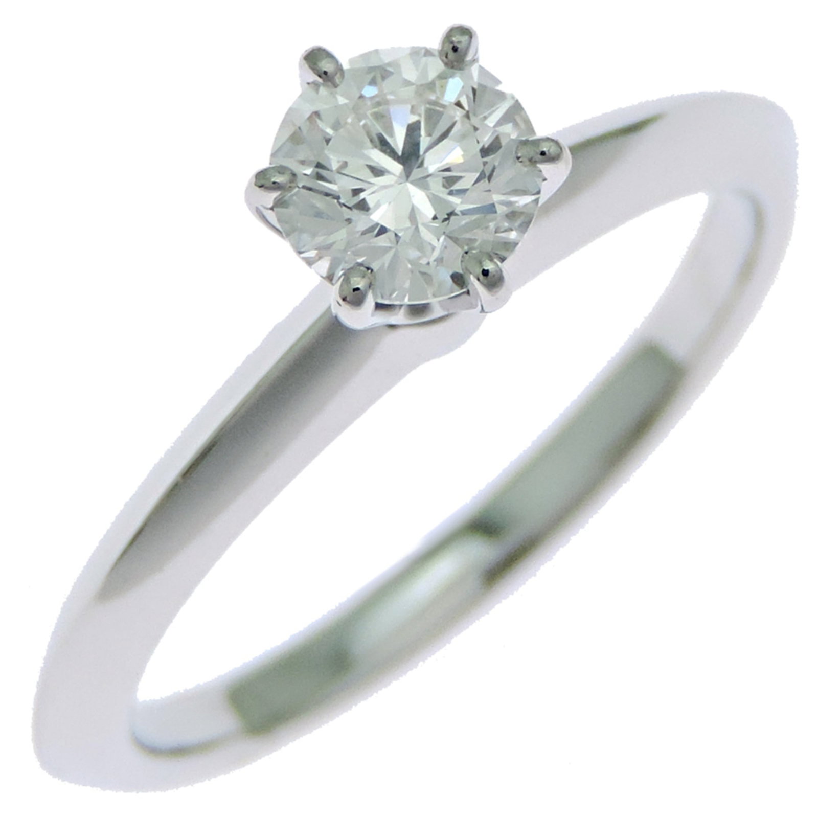 Platinum ring by Tiffany band: Platinum ring by Tiffany band Platinum ring by Tiffany & Co. features a diamond stone set in a high-quality platinum band, available in size 6. The ring has been well-cared for and shows some minor si