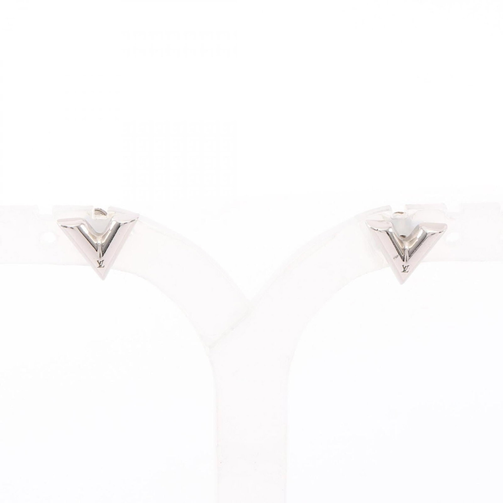 Stainless Steel Louis Vuitton Stud Earrings: Stainless Steel Louis Vuitton Stud Earrings Stainless Steel Louis Vuitton Stud Earrings in Silver, bearing the iconic brand's signature style. Traces of usage and minor scratches can be seen on these 