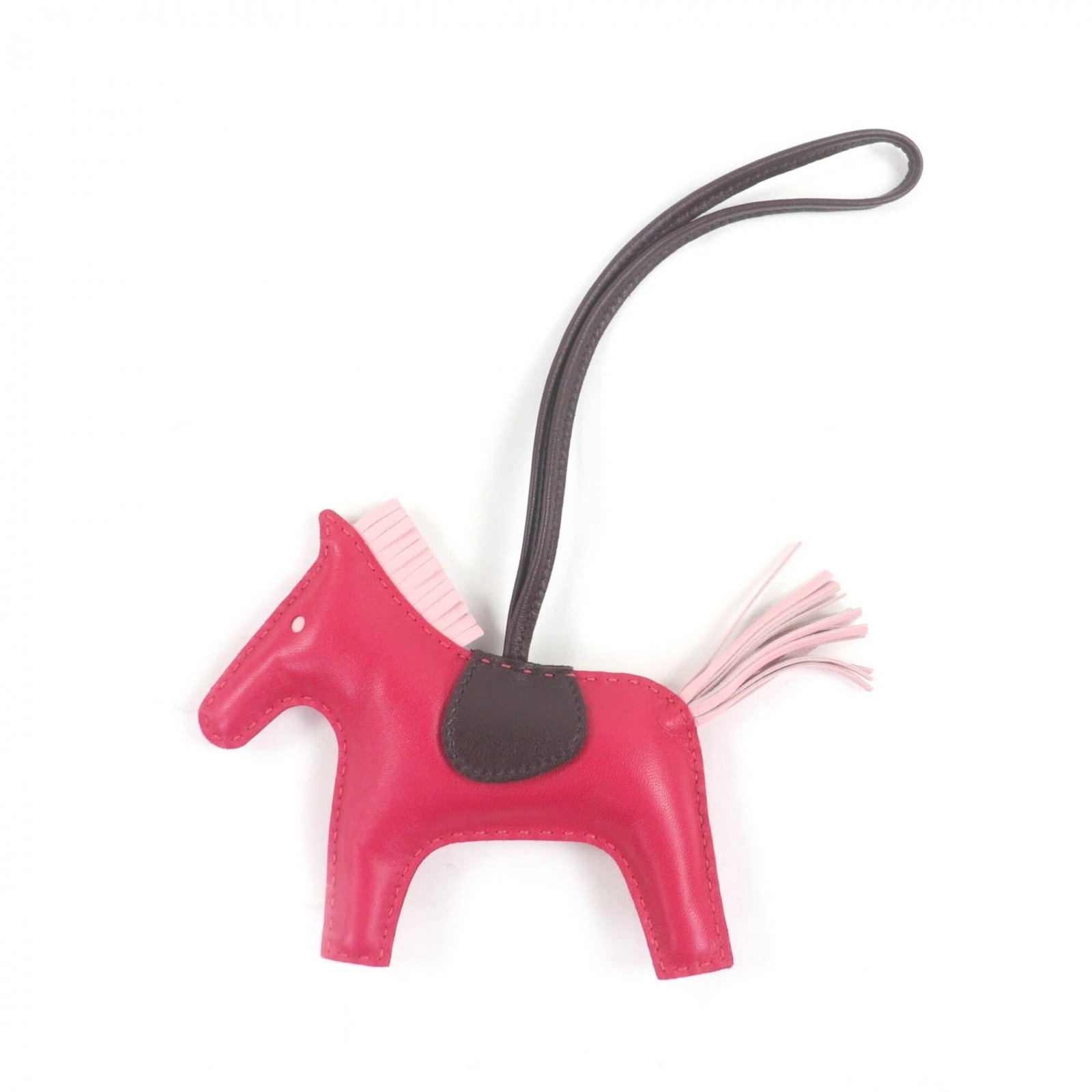 Hermes Handbag Charm Agneau Milo: Hermes Handbag Charm Agneau Milo Agneau Milo, the iconic Herm?s handbag charm, adds a touch of elegance to any accessory. Made from Agneau Milo material and featuring a rose sakura color, this