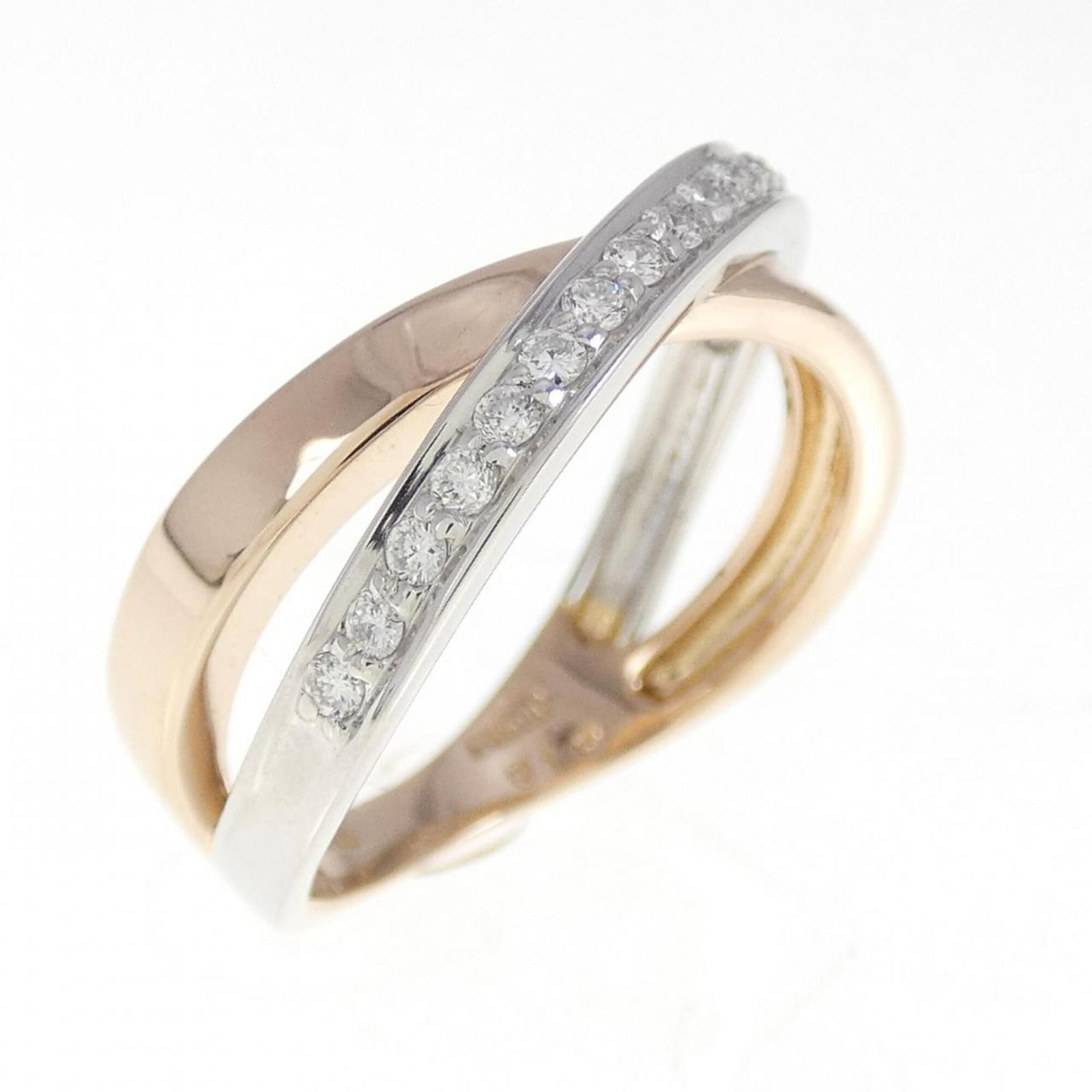 Vendome Aoyama Band Ring: Vendome Aoyama Band Ring 18K gold and platinum band ring with a pink diamond, weighing 0.19 carats in US size 6. The ring bears some scratches and minor traces of usage, but remains in very good