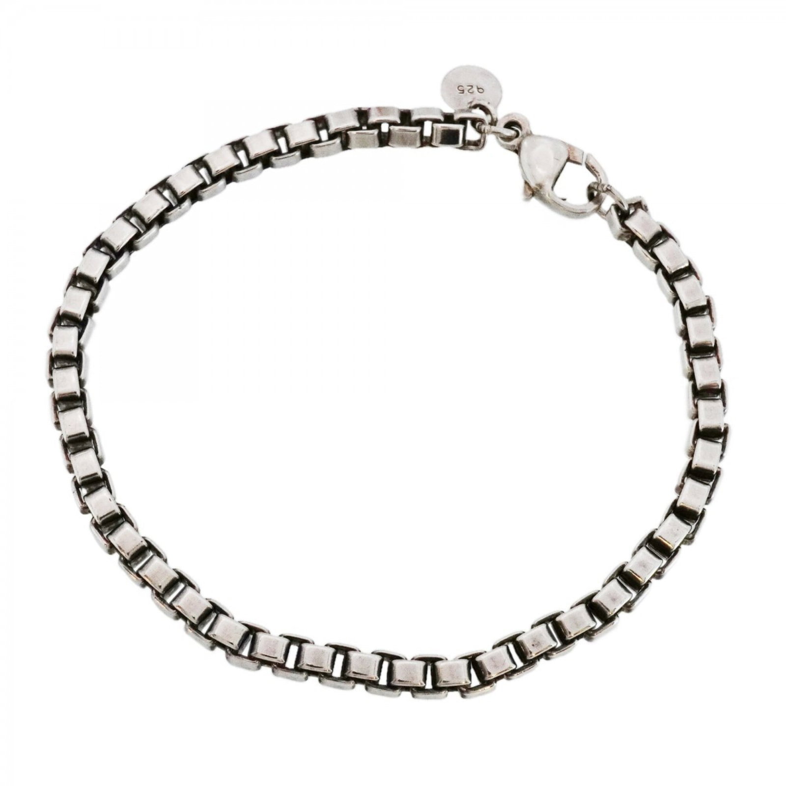 Charm Tiffany Bracelet 925 Silver: Charm Tiffany Bracelet 925 Silver Charm Tiffany Bracelet 925 Silver - A classic charm bracelet featuring sterling silver, measuring 18cm in length. With traces of usage and minor scratches, this 925