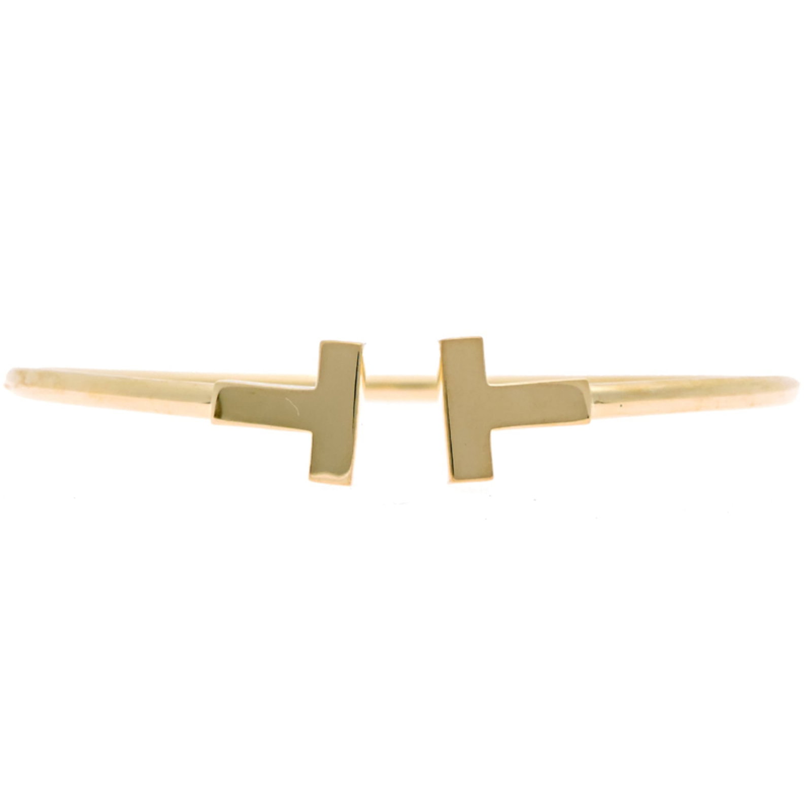 Tiffany Charm Bracelet Yellow Gold (18K): Tiffany Charm Bracelet Yellow Gold (18K) Yellow Gold (18K) Tiffany Charm Bracelet, featuring a classic design with subtle scratches and traces of usage. This 17.5cm charm bracelet showcases the