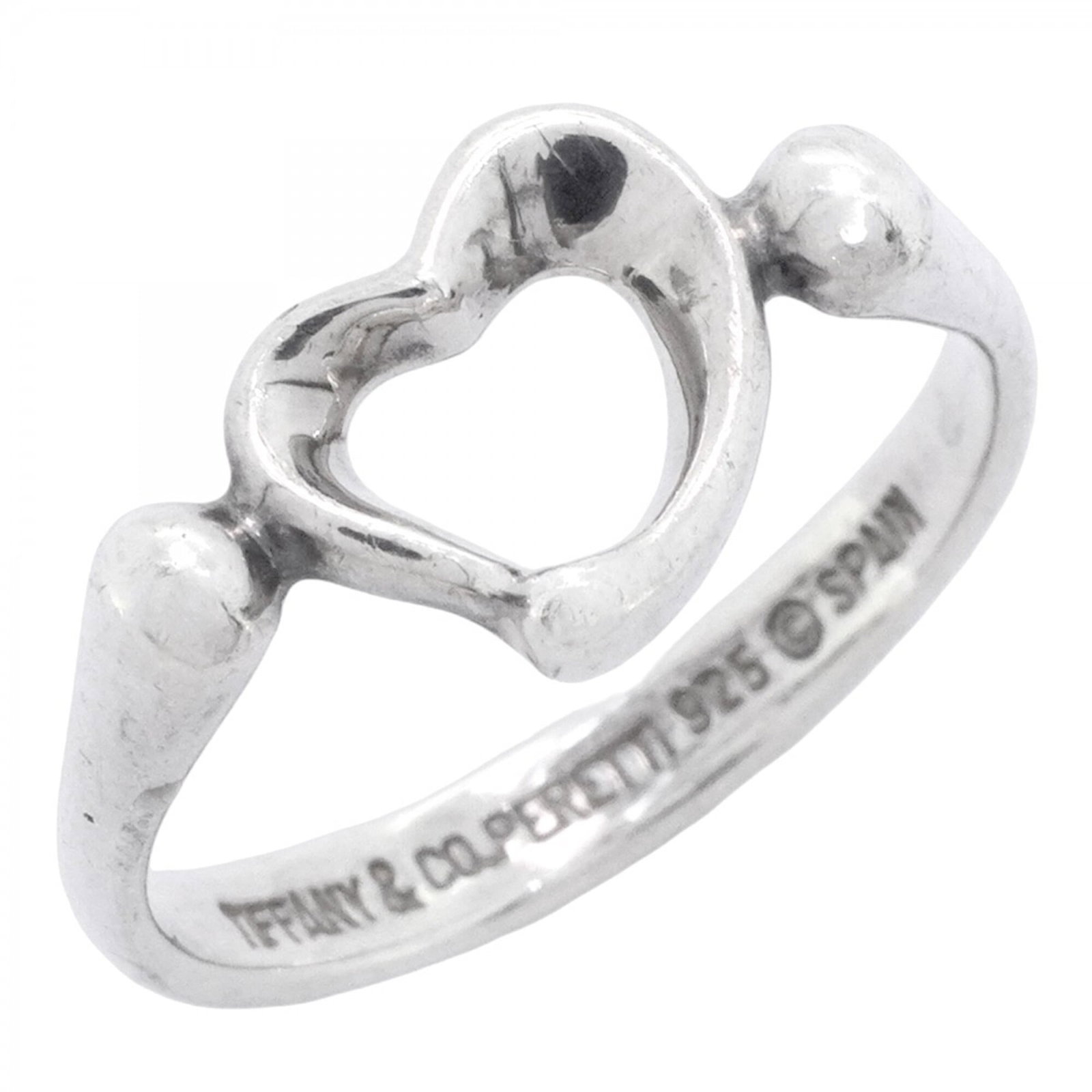 Tiffany Band Ring Silver 925: Tiffany Band Ring Silver 925 Silver 925 Tiffany Band Ring, Us Size 6.5, in good condition with traces of usage and minor scratches. This band ring features a silver 925 material and bears the Tiffany 