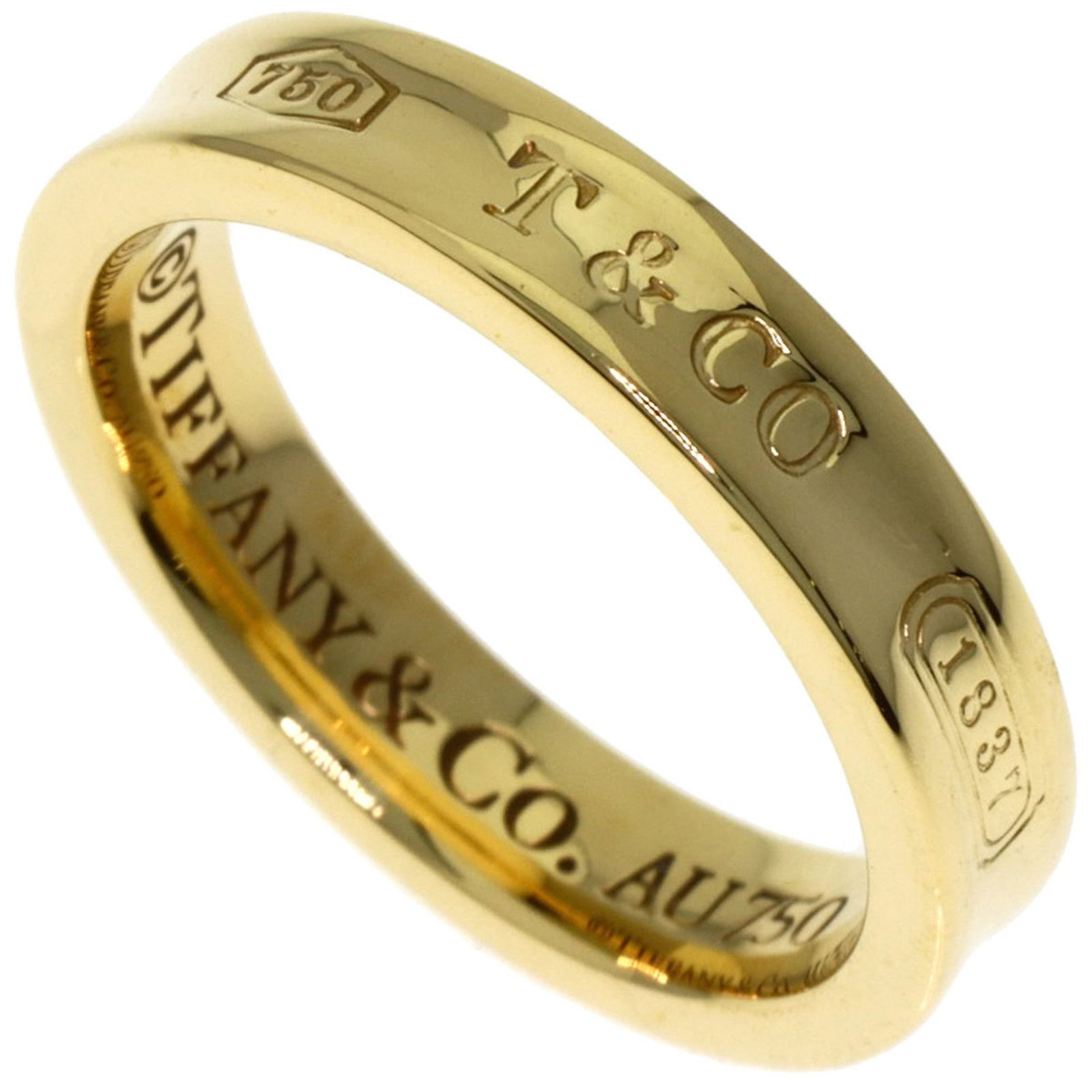 Tiffany Ring Gold Yellow 18K: Tiffany Ring Gold Yellow 18K Yellow gold band ring from Tiffany Type, crafted in 18K for a touch of elegance. This used ring features some scratches and dirt, but overall remains in very good conditio