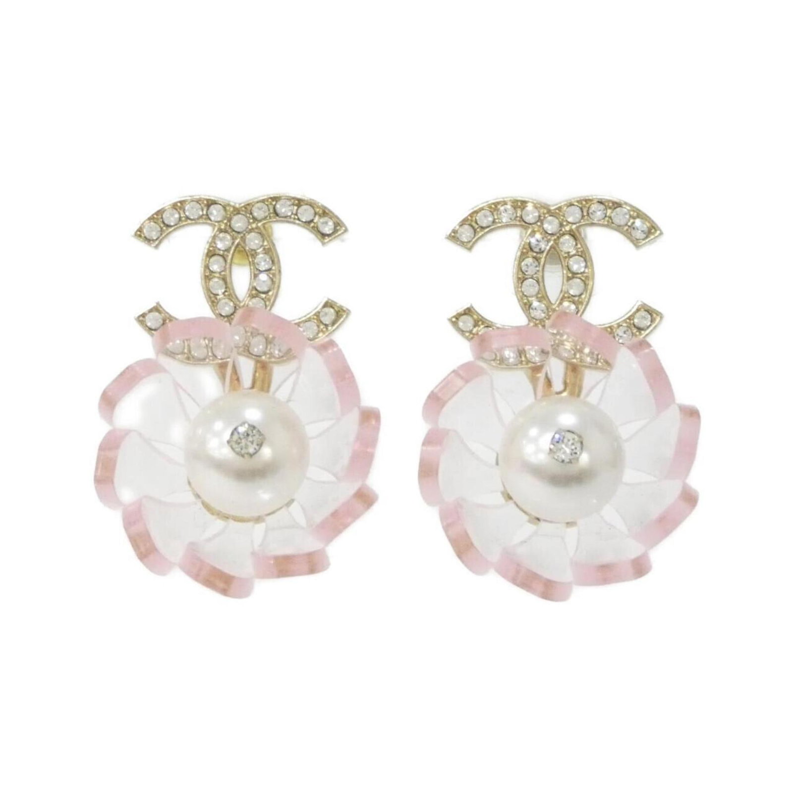 Earrings Drop Chanel: Earrings Drop Chanel Drop earrings from the iconic Chanel brand, featuring pink and white crystal stones. The earrings measure 30mm x 23mm in size and are made with a few traces of usage visible, incl