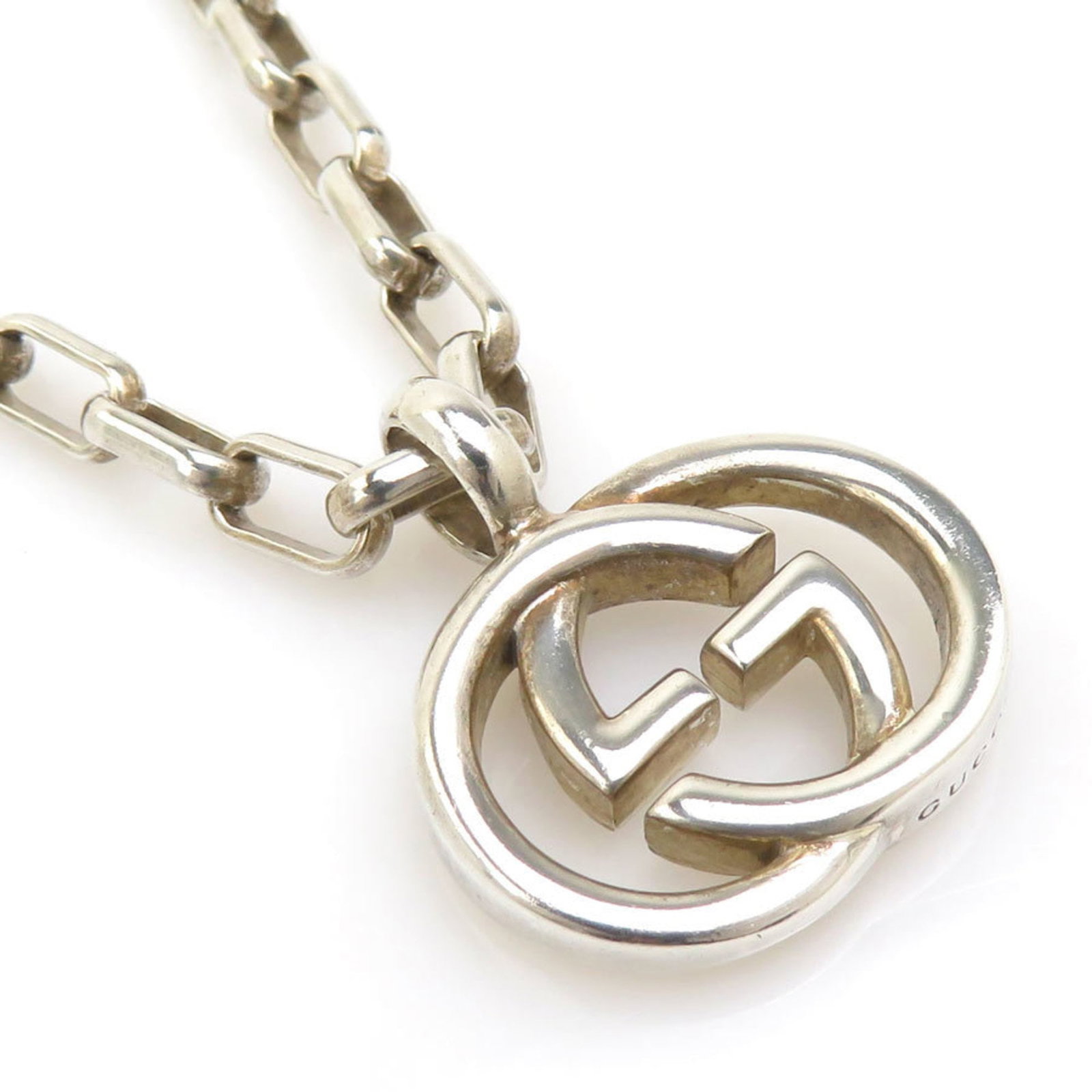 Silver 925 Men Gucci Necklace: Silver 925 Men Gucci Necklace Silver 925 Men Gucci Necklace features a sleek design with a silver pendant measuring 15mm x 20mm. The necklace has a comfortable neck circumference of 51 cm and is made