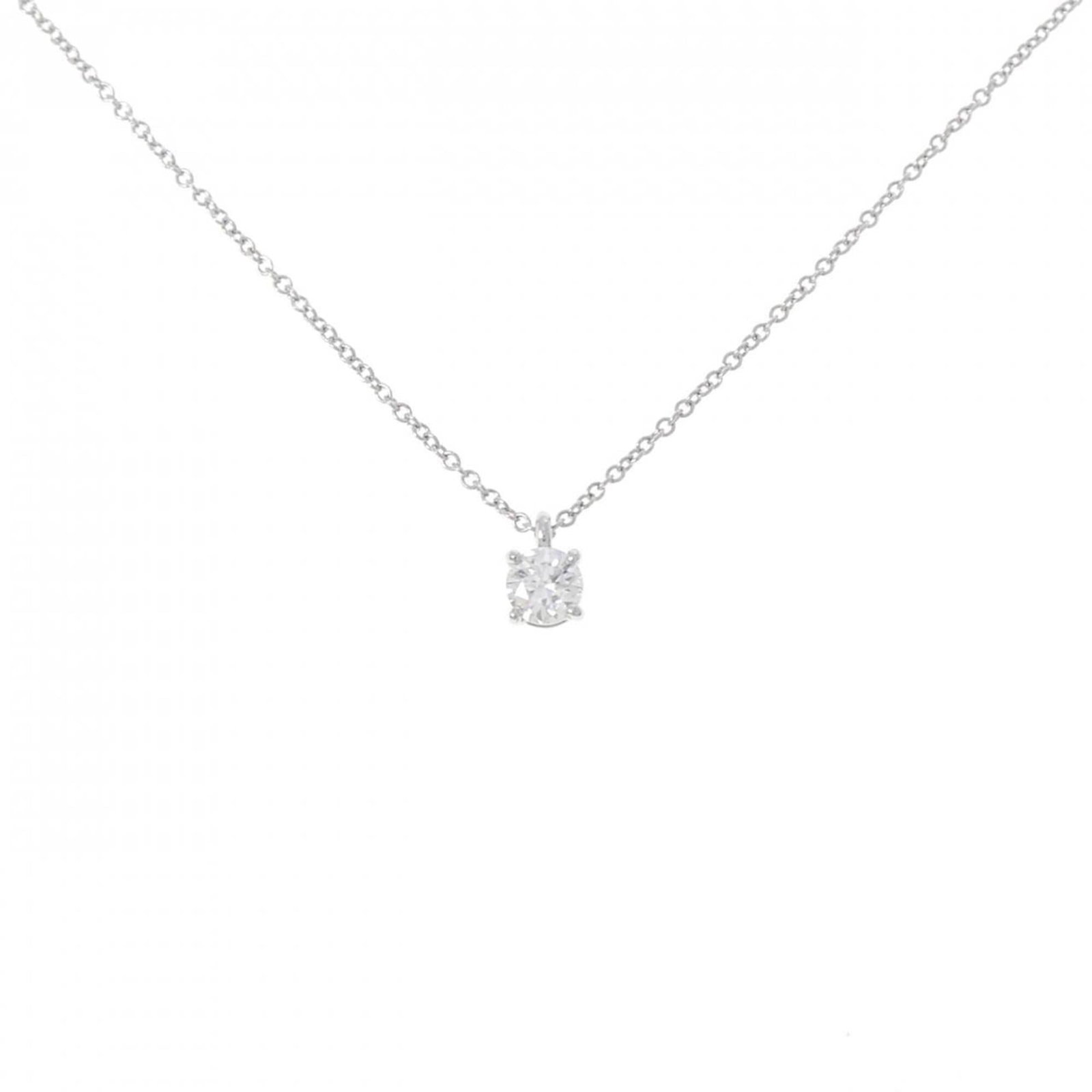 Solitaire Necklace by Tiffany Co 0.27CT F VS1 3EXT: Solitaire Necklace by Tiffany Co 0.27CT F VS1 3EXT Solitaire Necklace by Tiffany Co, featuring a 0.27CT F VS1 diamond set in platinum 950, offers understated elegance with its sleek silver design.