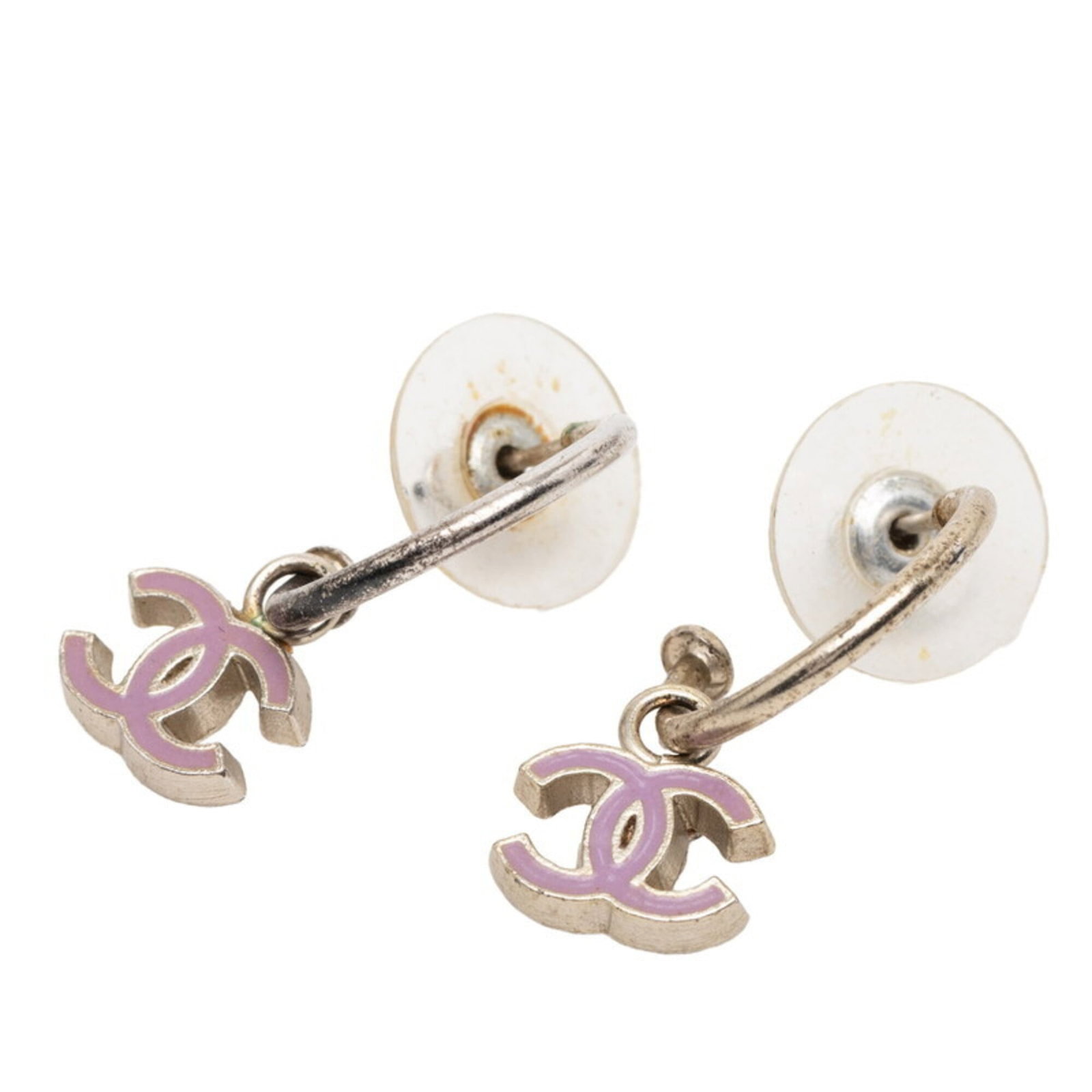 Stud Earrings Metal by Chanel: Stud Earrings Metal by Chanel Stud earrings by Chanel in pink and silver metal, featuring a classic design with subtle details. The earrings measure 7.20mm x 9.80mm and are made from high-quality