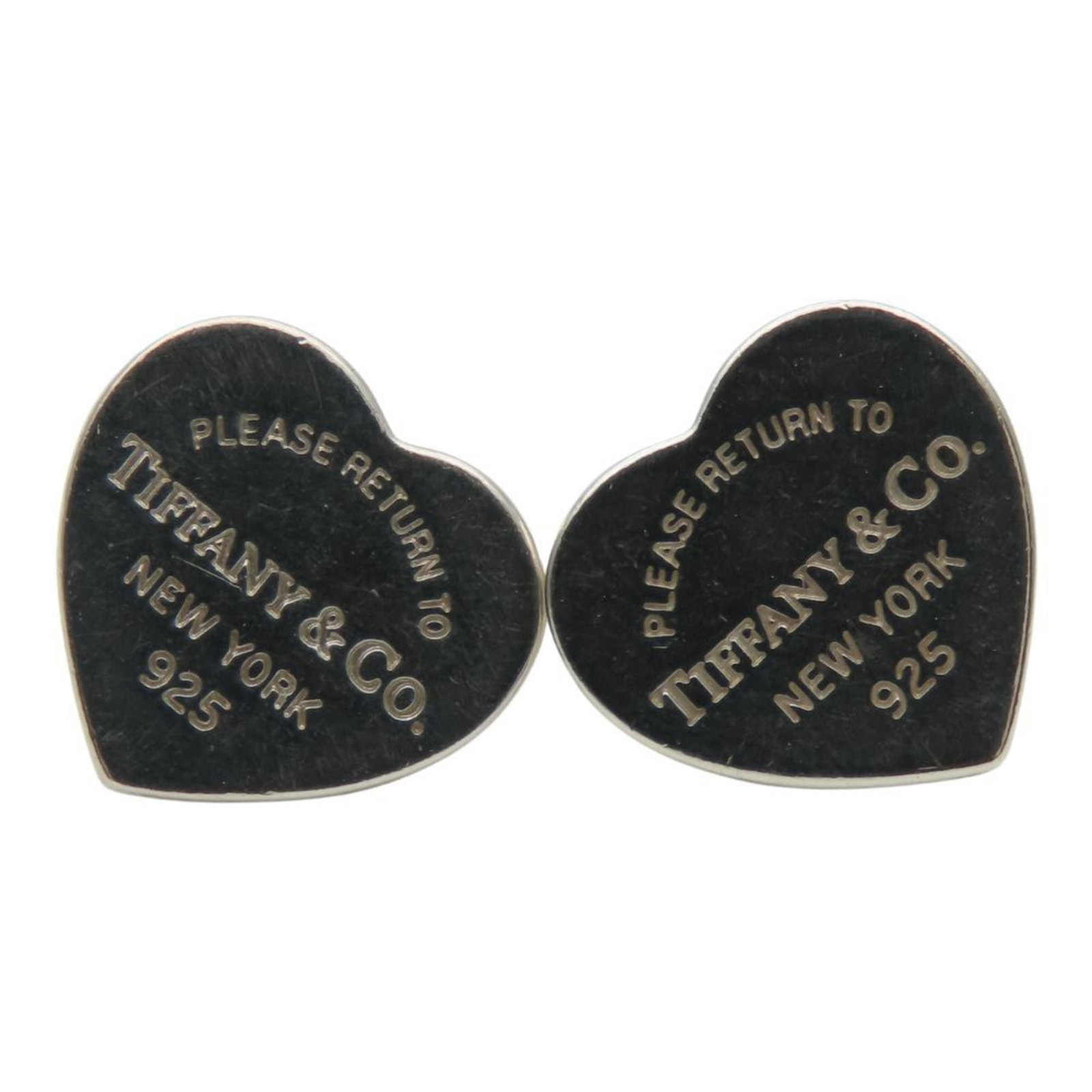 Silver 925 stud earrings by Tiffany: Silver 925 stud earrings by Tiffany Silver 925 stud earrings by Tiffany, featuring a classic design with subtle details, are available for purchase. The earrings showcase the iconic brand's signature 