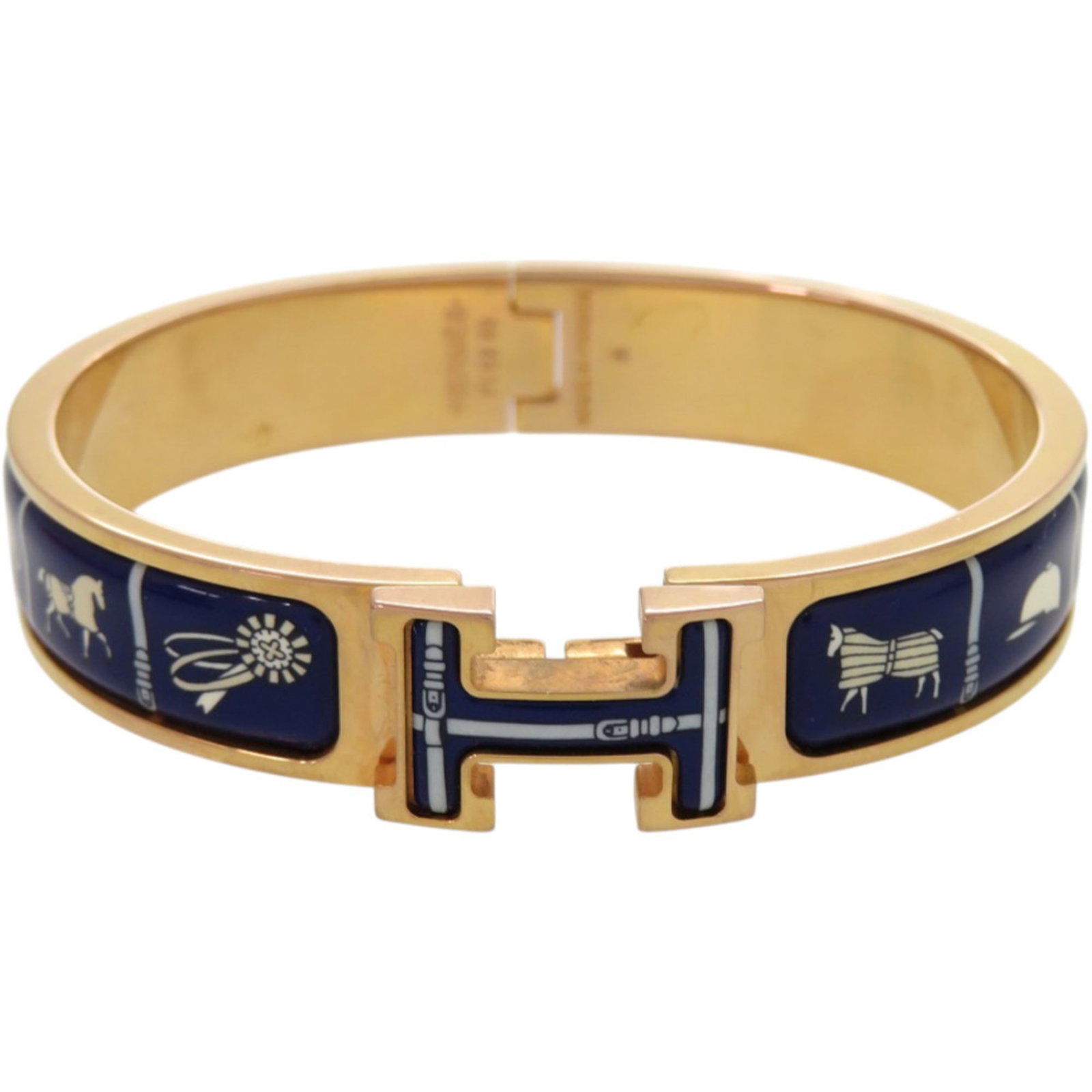 Metal Bangle Hermes: Metal Bangle Hermes A pre-owned Hermes metal bangle in blue, featuring a diameter of 16cm and width of 1.2cm, with a few traces of usage visible due to scratches and dirt. The item is in good conditio