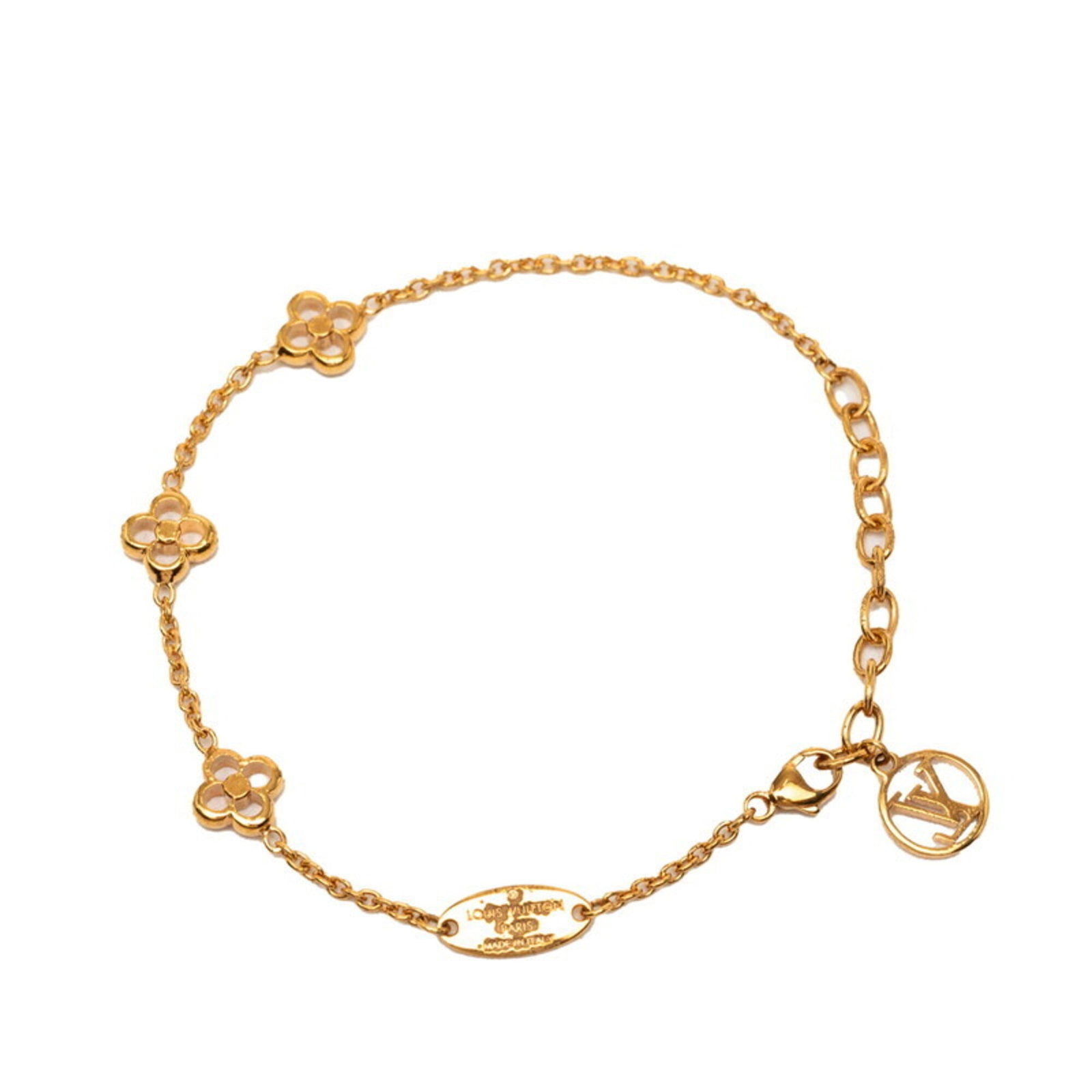 Charm Bracelet Louis Vuitton Gold: Charm Bracelet Louis Vuitton Gold This Louis Vuitton gold-plated charm bracelet boasts a classic design with a touch of luxury. Measuring 18.5cm in length, it features subtle signs of wear and tear,
