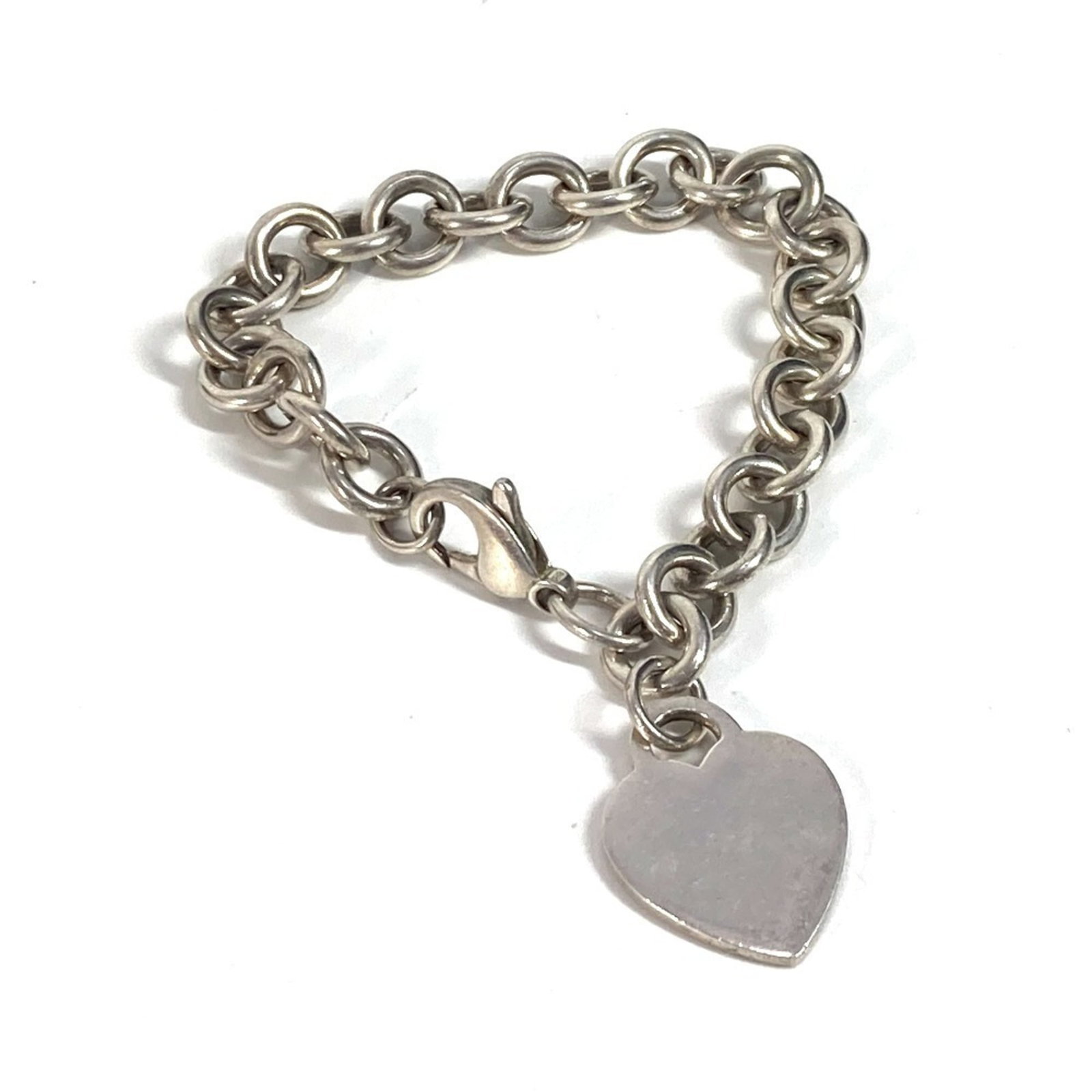 Charm Tiffany Bracelet 925 Silver: Charm Tiffany Bracelet 925 Silver Charm Tiffany Bracelet 925 Silver - A delicate, sterling silver charm bracelet with a total length of 17.5cm, featuring a subtle silver tone and slight traces of usag