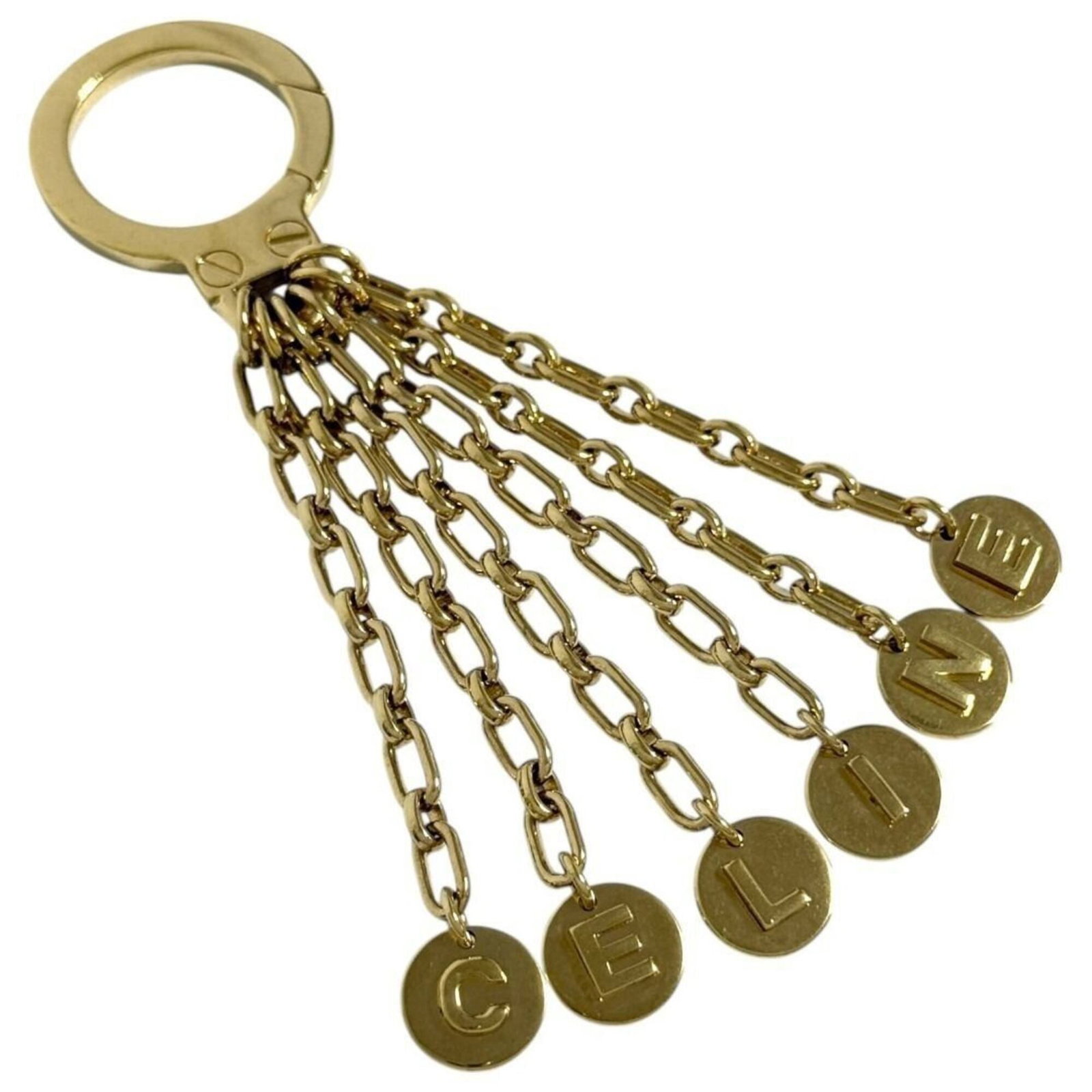 Metal Handbag Celine Charm: Metal Handbag Celine Charm Metal Celine Handbag Charm in Very Good Condition. This metal handbag charm bears the signature of the renowned luxury fashion brand, Celine, and features a sleek design tha