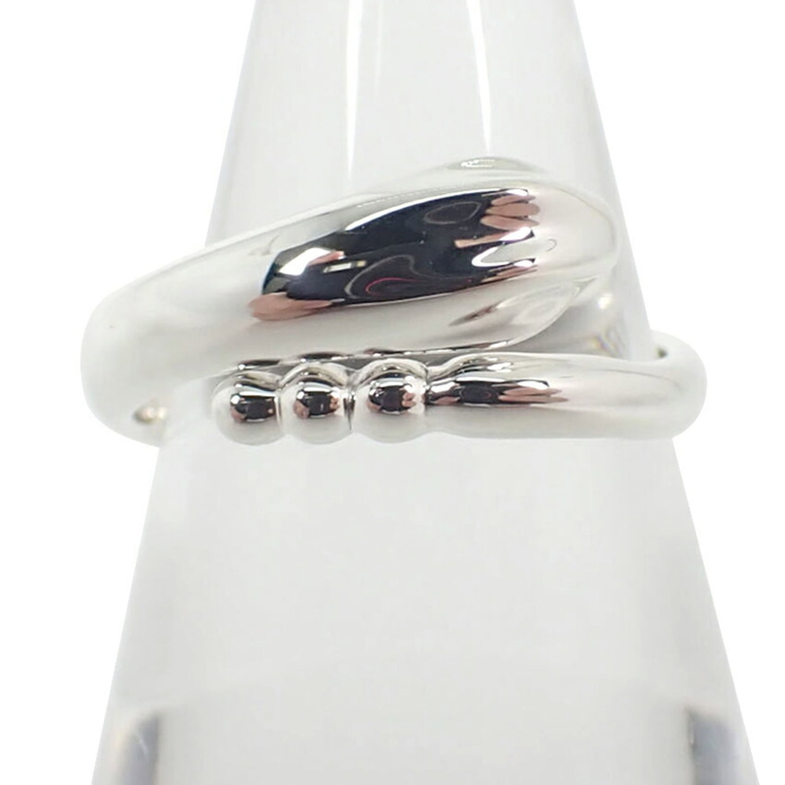 Sterling Silver Ring Tiffany Band: Sterling Silver Ring Tiffany Band Sterling silver ring from Tiffany, featuring a classic band design. The item bears a signature and is made from high-quality sterling silver (925). In very good condi