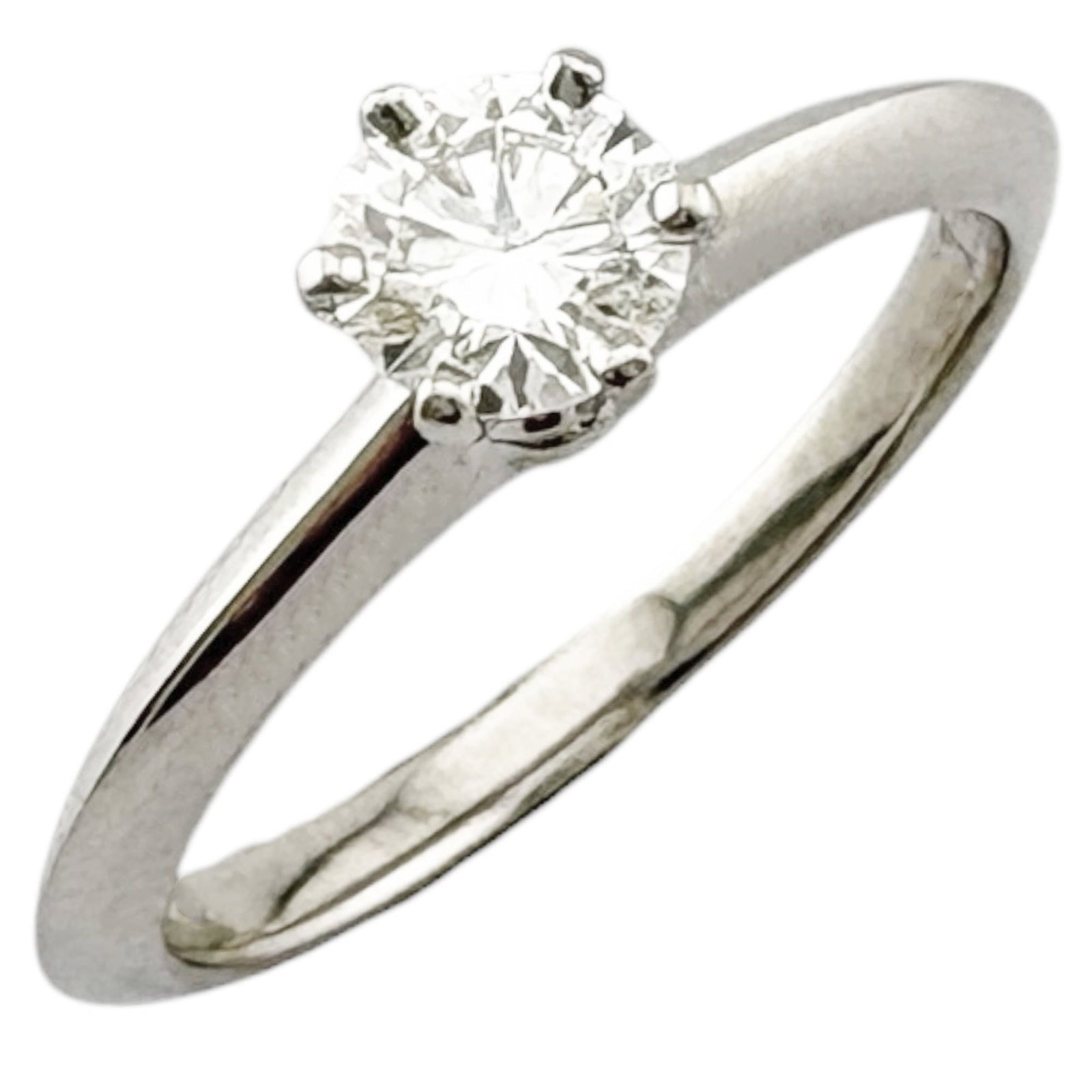 Platinum ring by Tiffany band: Platinum ring by Tiffany band Platinum ring by Tiffany features a sleek silver band with a high-quality platinum material, available in US size 4.5. This like-new condition item shows hardly any signs