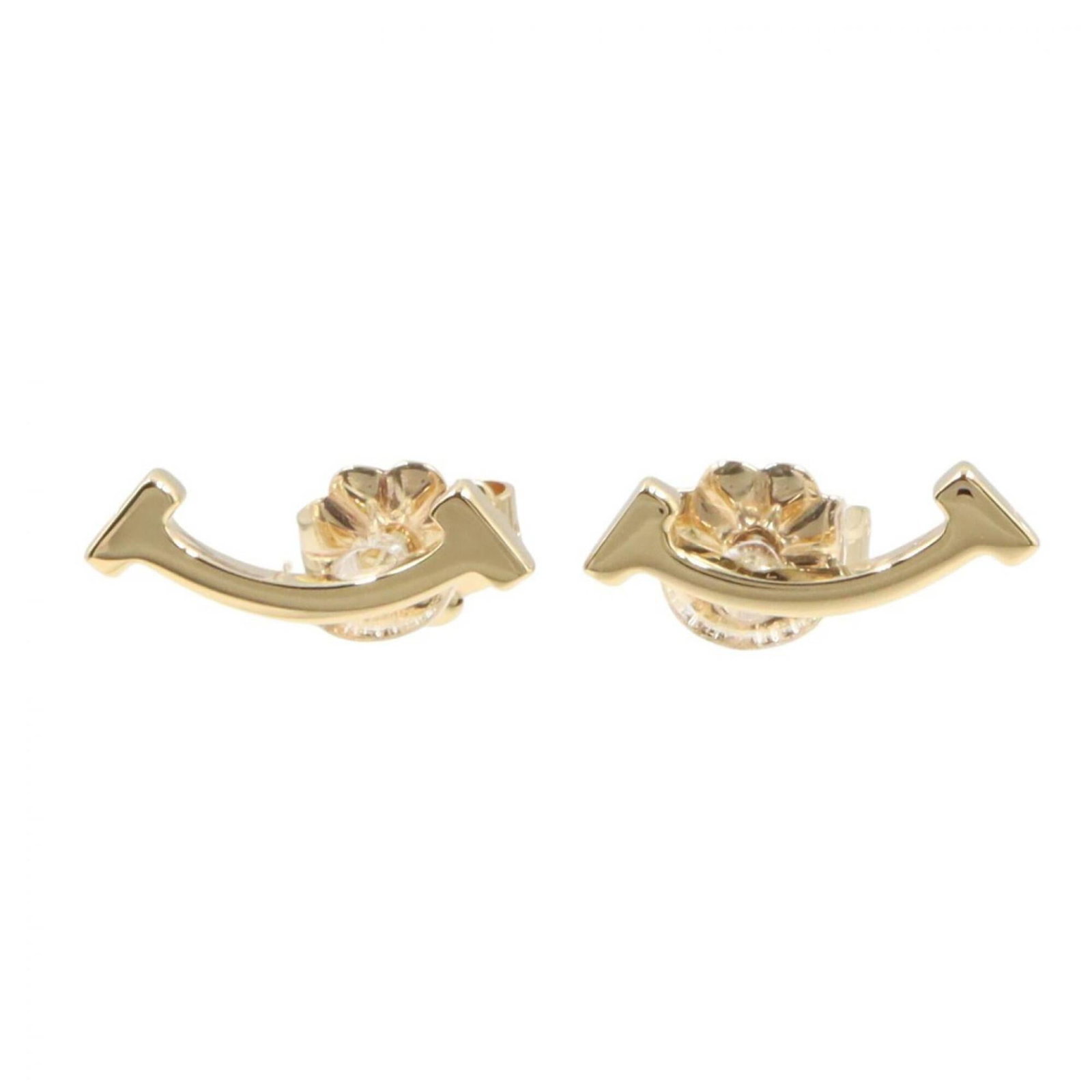 Gold Stud Yellow Earrings Tiffany: Gold Stud Yellow Earrings Tiffany Yellow Gold (18K) Stud Earrings from Tiffany, bearing a few traces of usage and minor scratches. Made from high-quality yellow gold, these stud earrings showcase a cl