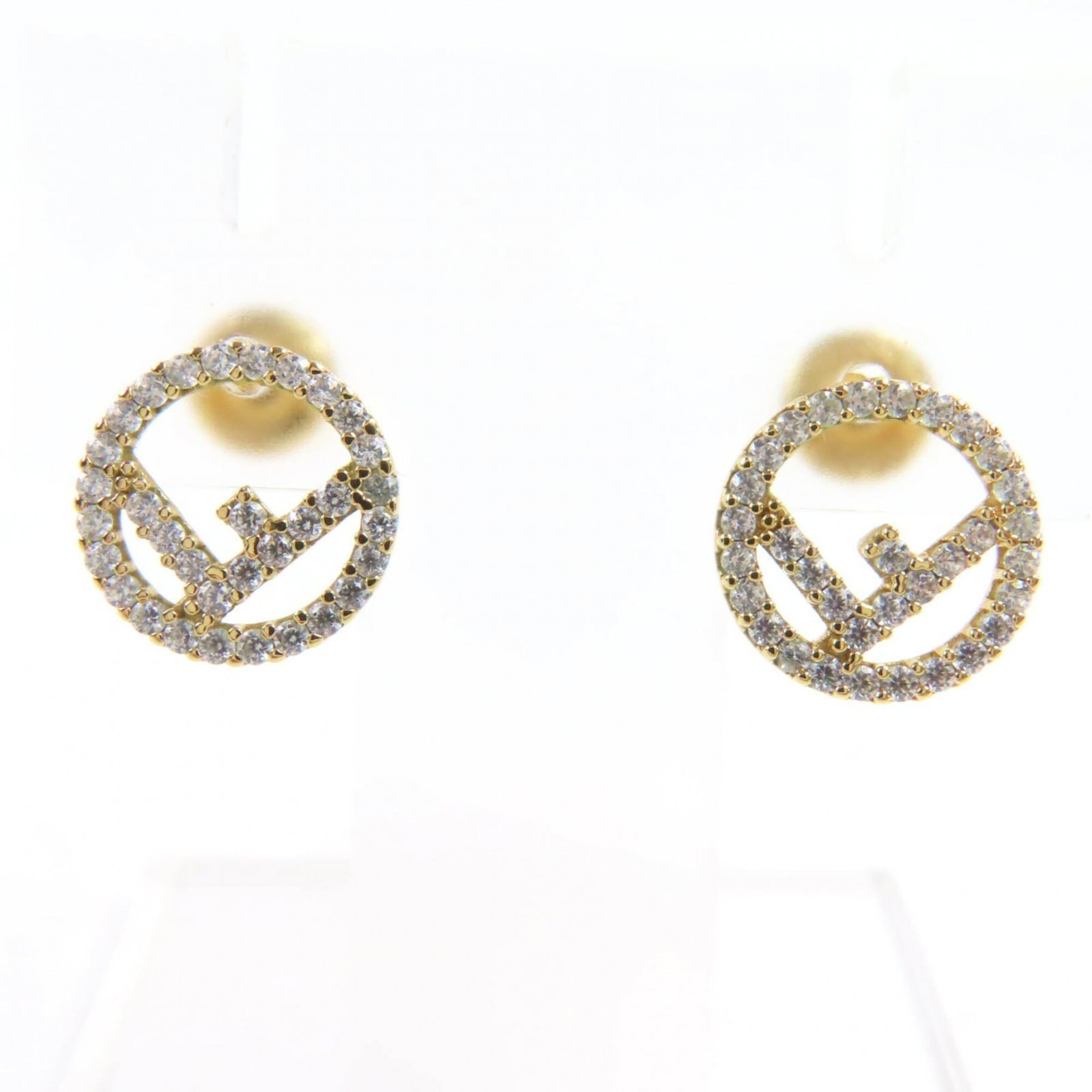 Fendi stud earrings: Fendi stud earrings Stud earrings from Fendi, featuring gold and silver options. In mint condition with minimal wear, these small yet elegant pieces showcase the luxury brand's signature style.