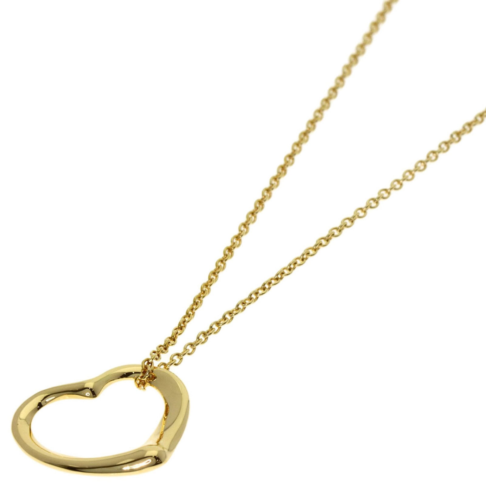 Women's yellow gold heart necklace by Tiffany & Co.: Women's yellow gold heart necklace by Tiffany & Co. Yellow gold heart necklace by Tiffany & Co. features a 12.3mm x 14.8mm pendant in 18K yellow gold, suspended from a chain with a 41 cm / 16.14'' nec