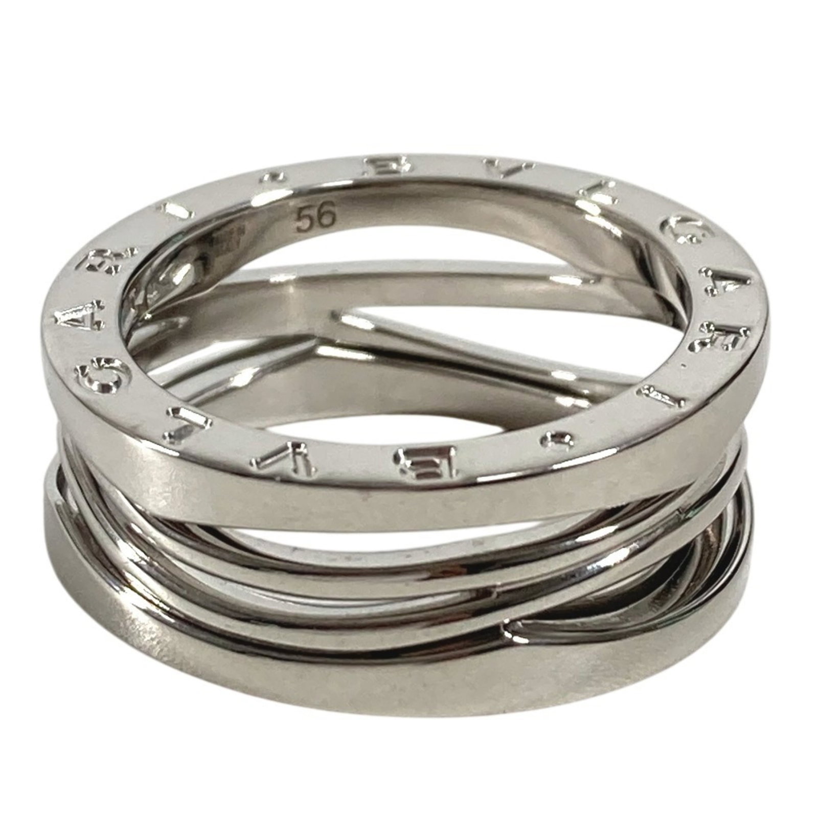 Bvlgari Band Ring White Gold (18K): Bvlgari Band Ring White Gold (18K) Bvlgari Band Ring White Gold (18K) is a stylish and elegant accessory made from high-quality white gold. With its classic design, this band ring features 56 Us