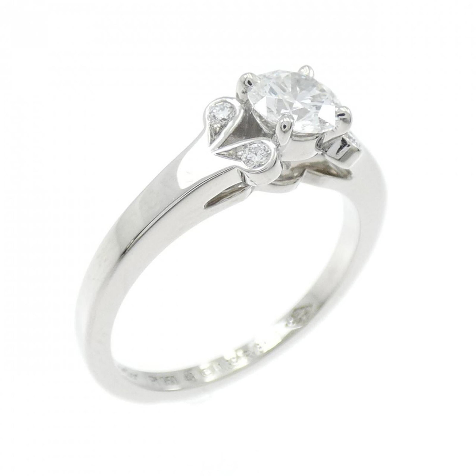 Ring Band by Platinum 950: Ring Band by Platinum 950 Used Cartier Ring Band made from Platinum 950, featuring a diamond stone. The band bears some scratches and dirt, but remains in very good condition overall. A few traces of