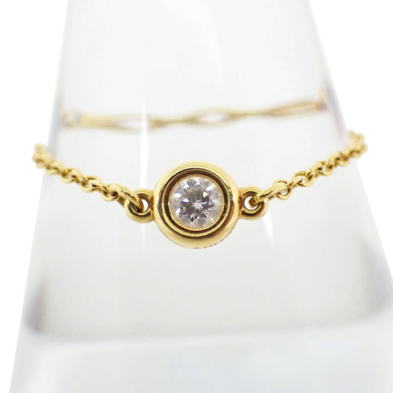Tiffany Ring Gold Yellow 18K: Tiffany Ring Gold Yellow 18K Yellow gold band ring from Tiffany featuring a diamond stone, in excellent condition with some minor scratches and dirt. The 18K gold construction provides durability and 