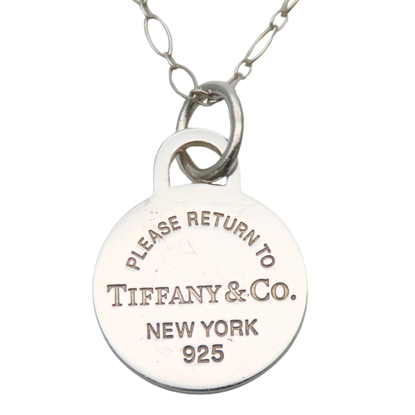 Tiffany & Co. Return To London Round Tag Sv925 Plate Pendant Necklace For Women.: Tiffany & Co. Return To London Round Tag Sv925 Plate Pendant Necklace For Women. Silver Tiffany & Co. Return To London Round Tag Sv925 Plate Pendant Necklace For Women, featuring a classic design