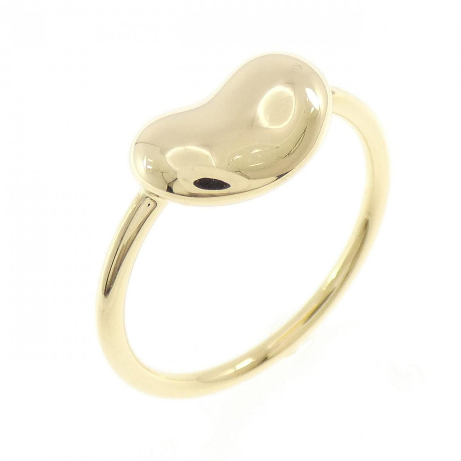 Tiffany Ring Gold Yellow 18K: Tiffany Ring Gold Yellow 18K Tiffany's iconic gold yellow band ring, crafted from 18K yellow gold. This used, very good condition ring features some scratches and dirt but remains in excellent