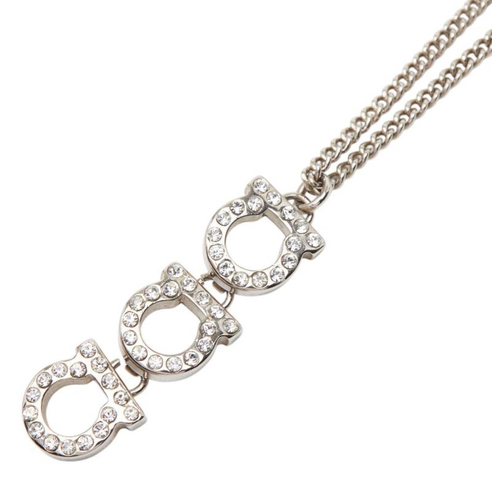 Salvatore Ferragamo Gancini Necklace Silver Metal Rhinestone Women'S: Salvatore Ferragamo Gancini Necklace Silver Metal Rhinestone Women'S Silver metal and rhinestone details adorn this Salvatore Ferragamo Gancini necklace, adding a touch of glamour to any outfit. The