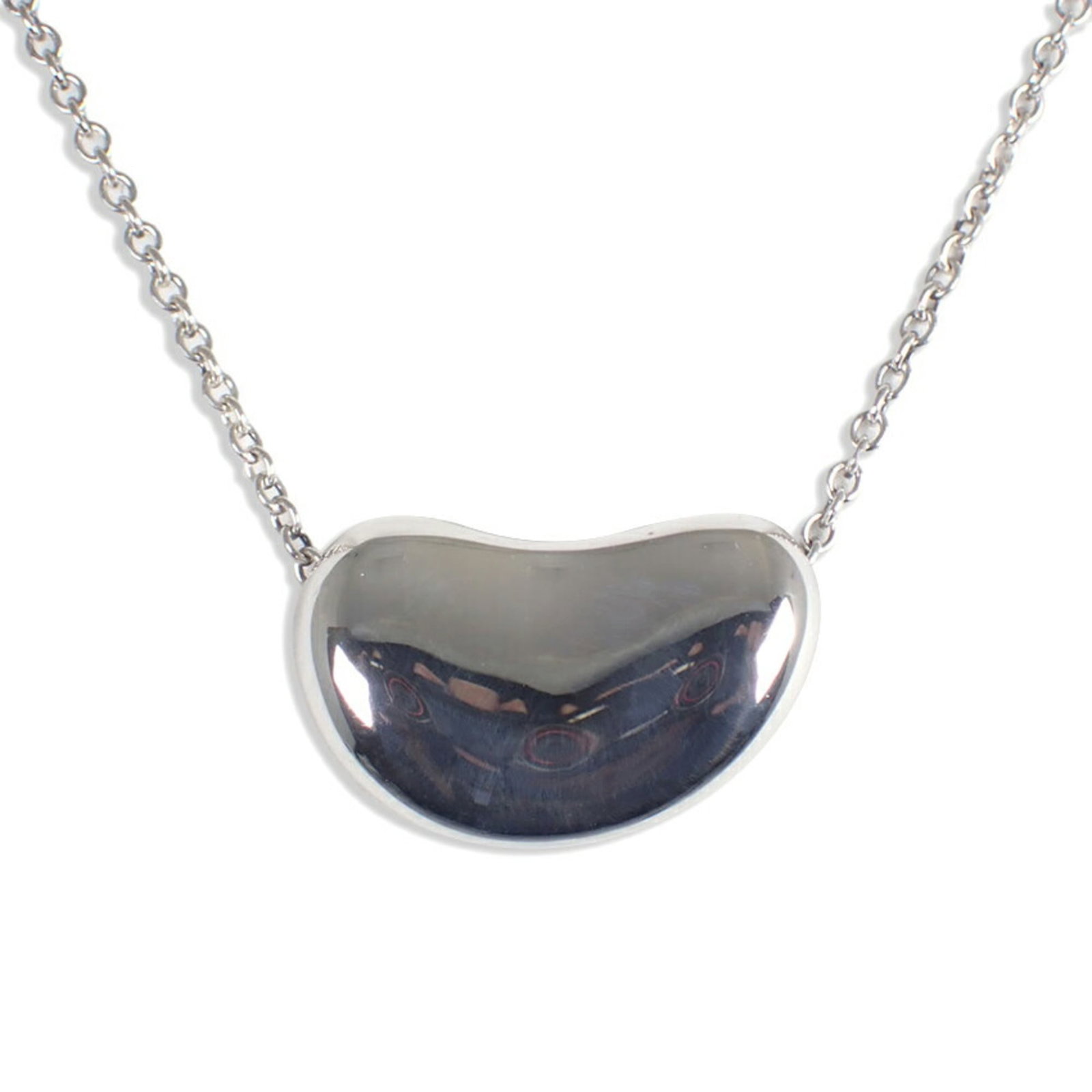 Bean Pendant Necklace by Tiffany & Co.: Bean Pendant Necklace by Tiffany & Co. Sterling silver pendant necklace by Tiffany & Co., featuring a sleek and sophisticated design. The pendant measures 13mm x 20.5mm, suspended from a sterling