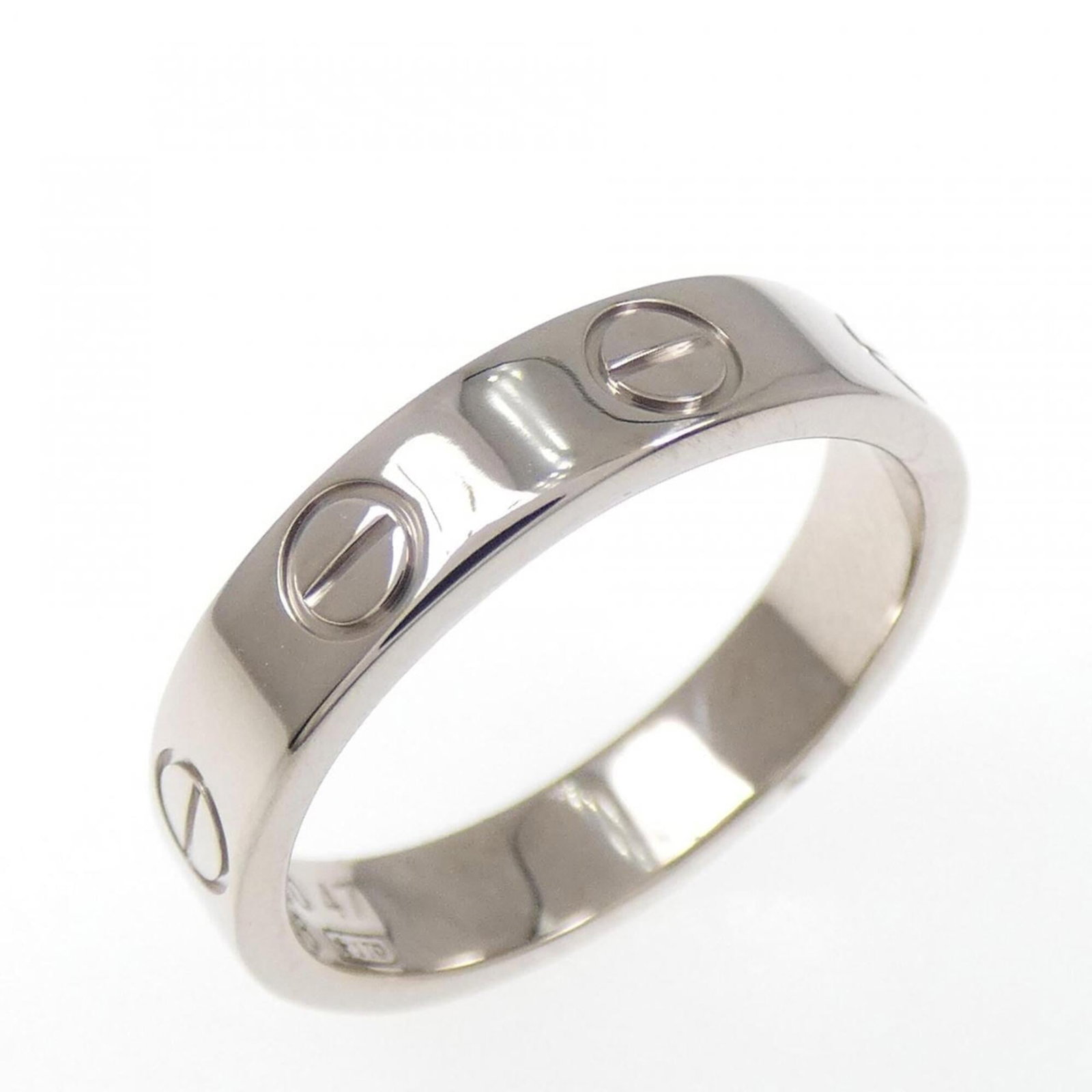 White Gold Cartier Band Ring 18K: White Gold Cartier Band Ring 18K 18K White Gold Cartier Band Ring for Women. This used band ring features a classic design with a subtle 3.5mm width and weighs 3.7g, showcasing the elegance of 18K whi