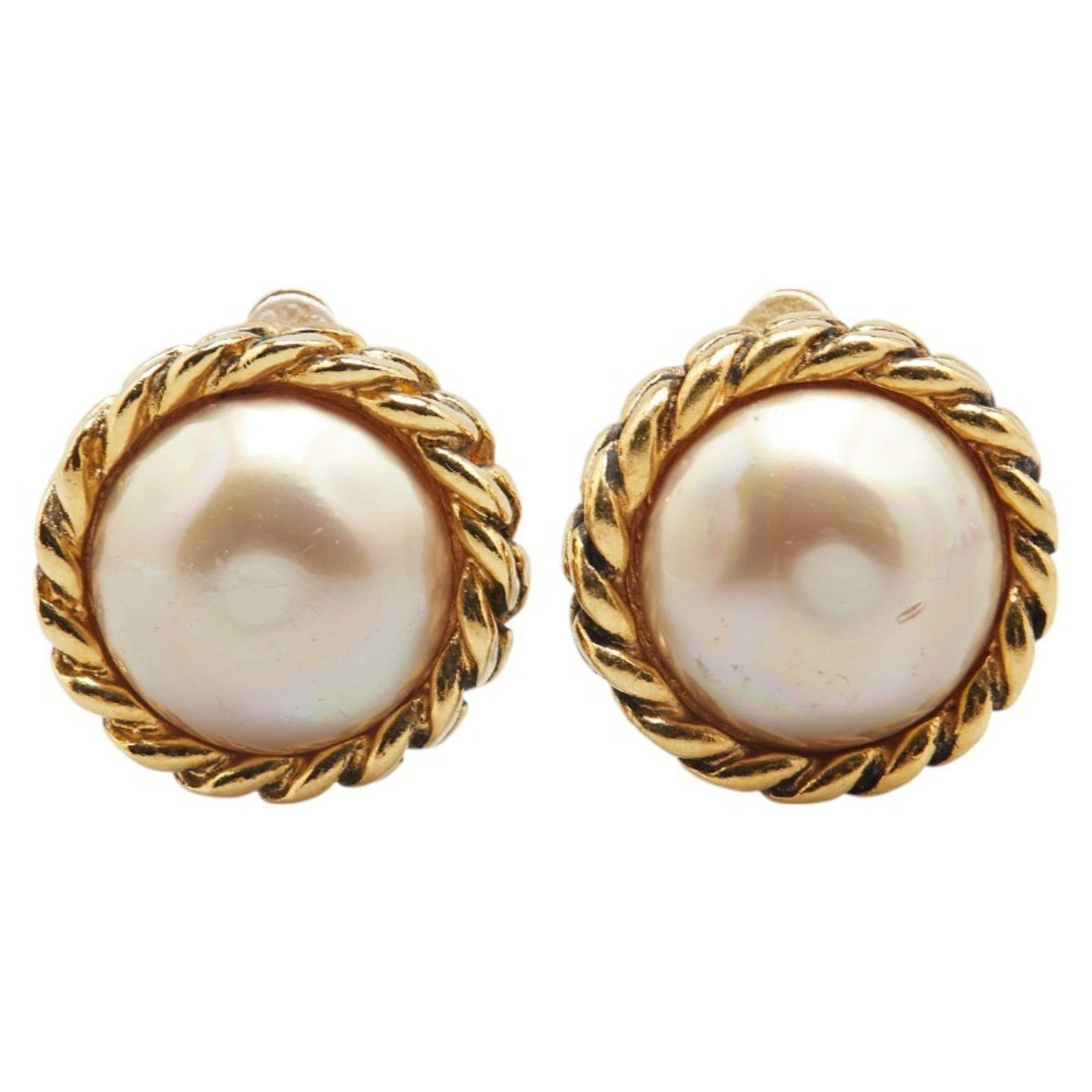 Chanel Clip Earrings: Chanel Clip Earrings Gold Pearl Clip Earrings from Chanel, featuring a classic design with a subtle shine. The earrings showcase a beautiful pearl stone set in a gold clip earring style, measuring