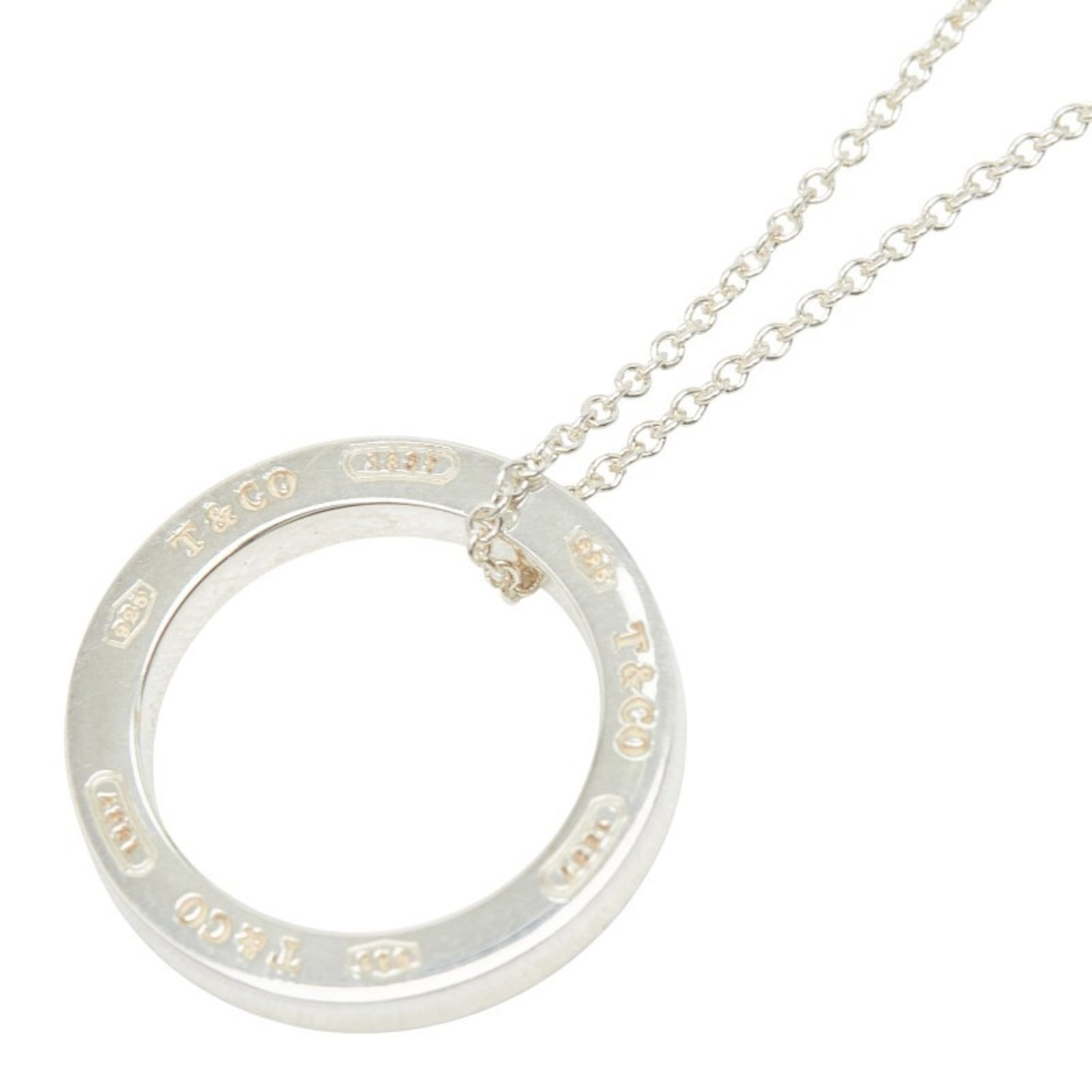 Sterling Silver Ring Necklace Circle In 925 Women Tiffany &: Sterling Silver Ring Necklace Circle In 925 Women Tiffany & Sterling silver ring necklace with a circle pendant in 925, bearing the Tiffany & Co. mark. The necklace features a classic design with a