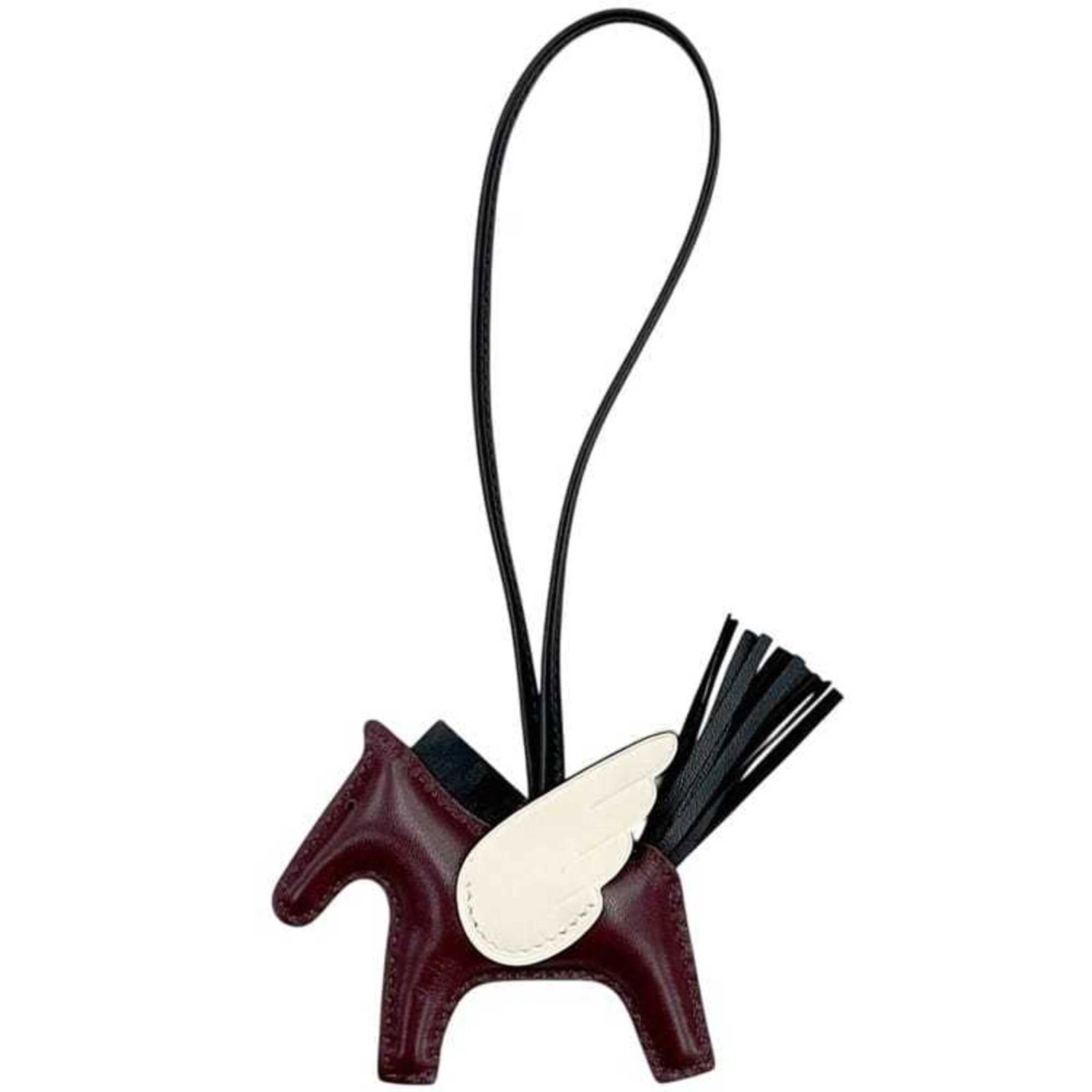 Hermes Handbag Charm Agneau Milo: Hermes Handbag Charm Agneau Milo Agneau Milo, the signature Herm?s handbag charm, adds a touch of elegance to any accessory. Made from high-quality Agneau Milo material, this charm features a sleek
