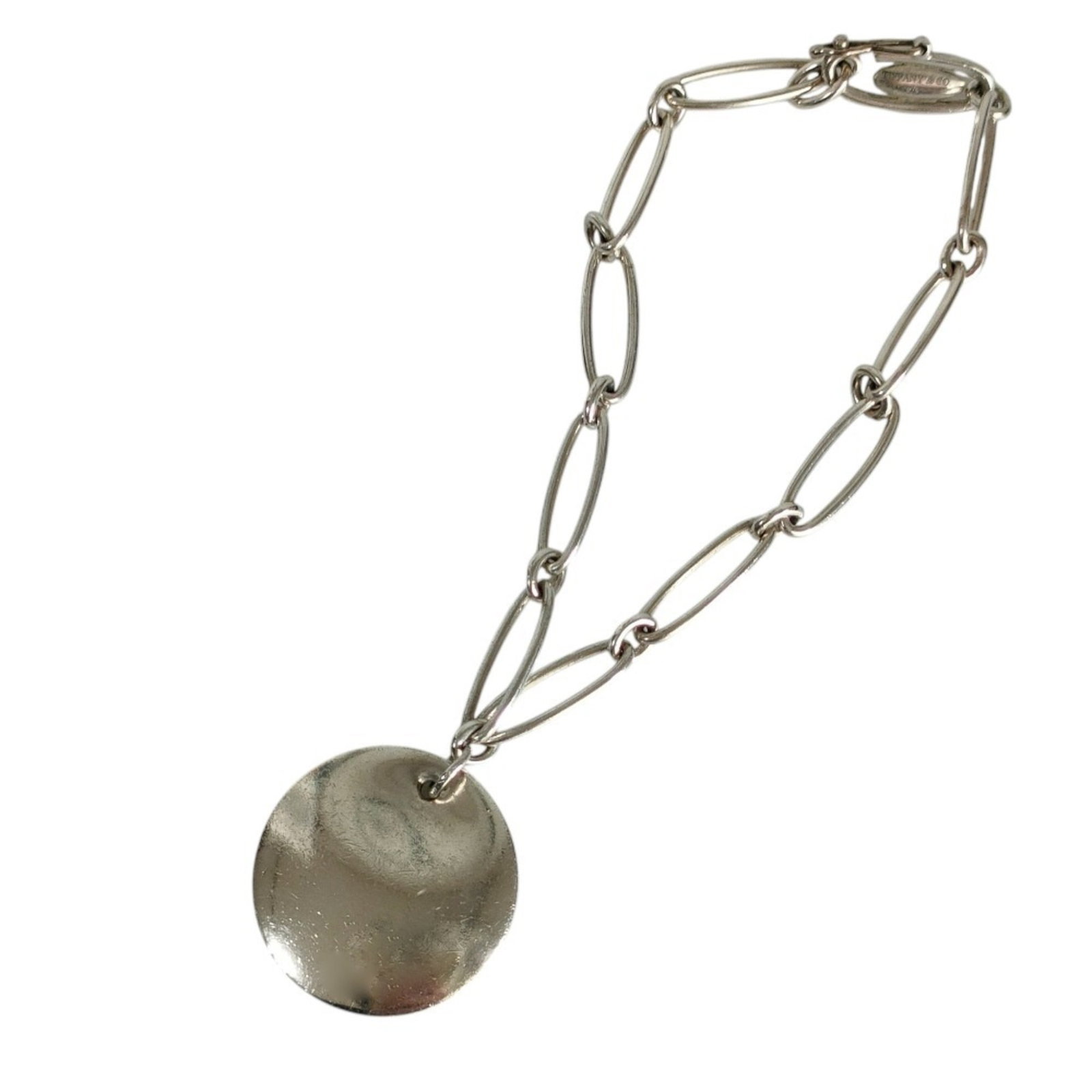 Tiffany bracelet link: Tiffany bracelet link Silver Tiffany link bracelet with a length of 18cm, bearing minor traces of usage and some scratches/dirt. The bracelet has been well-maintained overall, showing signs of