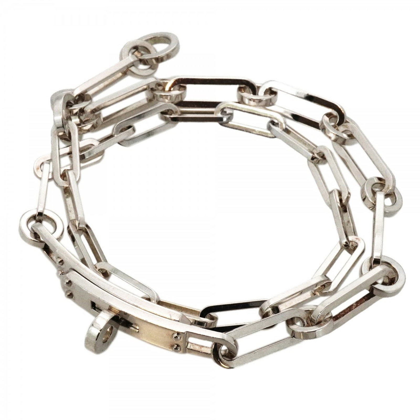Silver Charm Bracelet 925 by Hermes: Silver Charm Bracelet 925 by Hermes Silver Charm Bracelet 925 by Hermes features a classic design with subtle charm details, crafted from high-quality silver 925 material. The bracelet measures 16.5cm