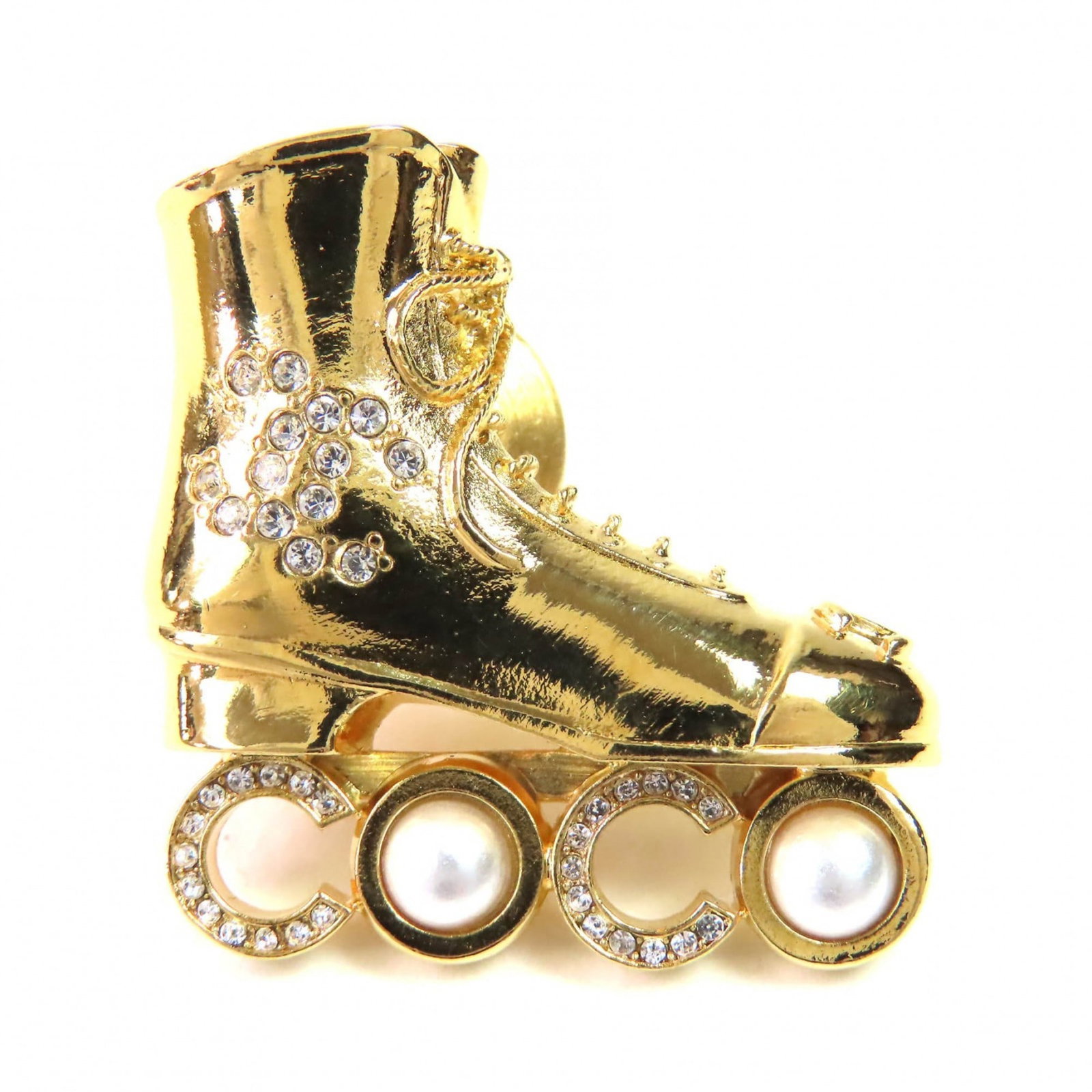 Chanel Brooch: Chanel Brooch Gold Chanel Brooch with Artificial Pearl and Rhinestone Features. The brooch measures 2.3cm x 2.5cm, showcasing a striking gold design adorned with an artificial pearl and rhinestone. In