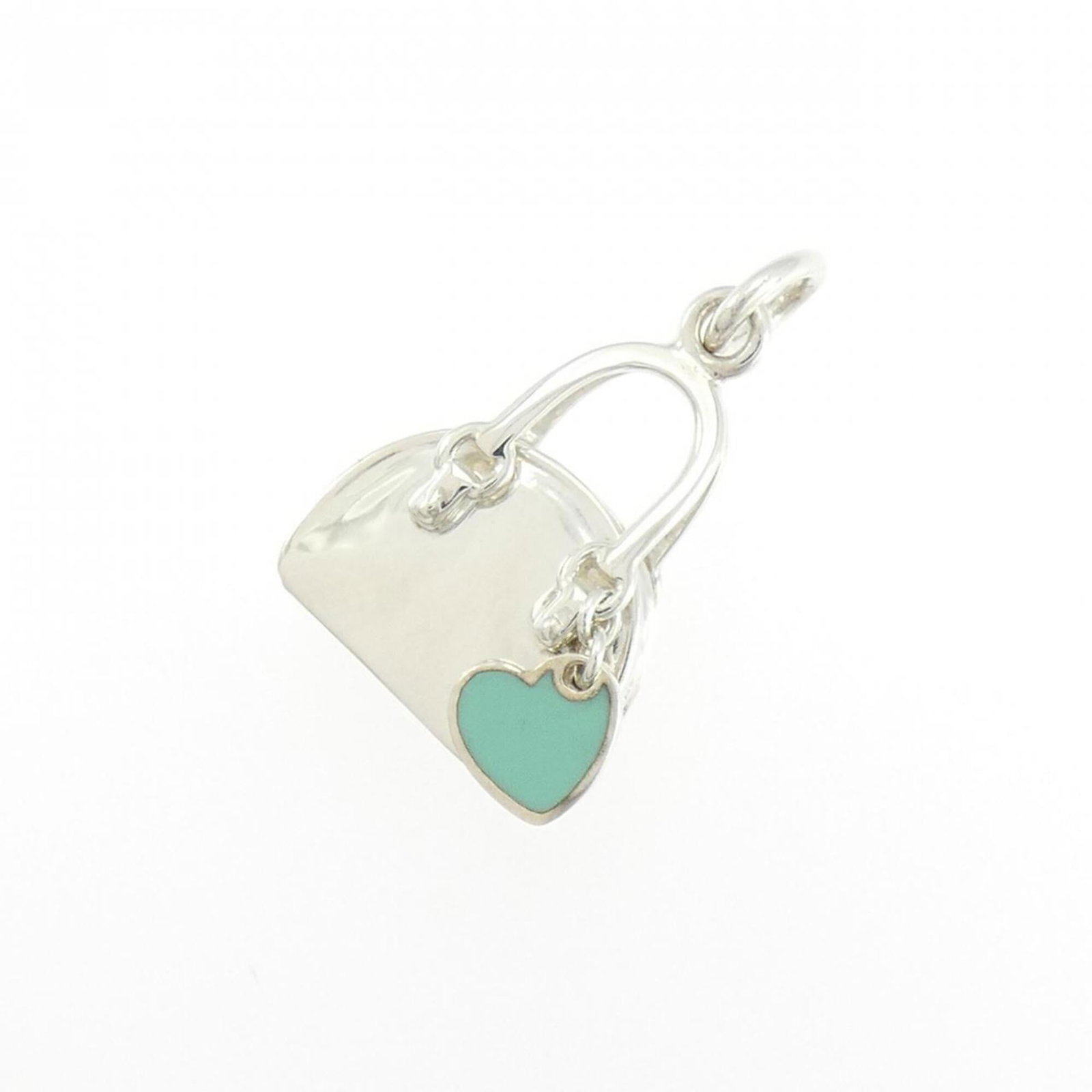 Pendant Handbag Tiffany: Pendant Handbag Tiffany Silver Tiffany pendant necklace features a 26mm x 14.5mm design, bearing the hallmark of 925 sterling silver. The item has undergone some wear and tear, with minor scratches