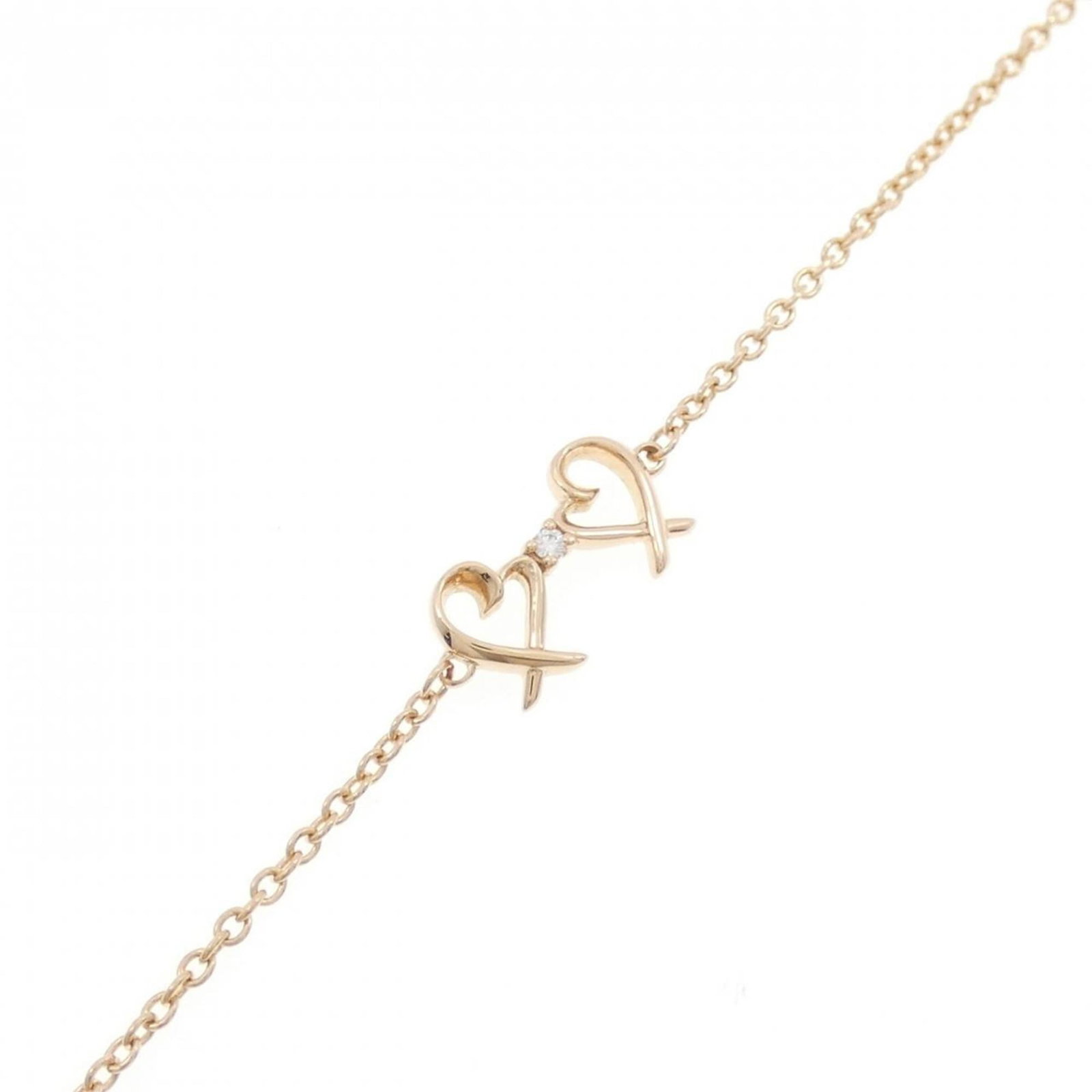 Pink Gold 18K Tiffany Charm Bracelet: Pink Gold 18K Tiffany Charm Bracelet Pink Gold 18K Tiffany Charm Bracelet, a lovely piece featuring the iconic brand's signature style. Made from high-quality pink gold (18K), this charm bracelet