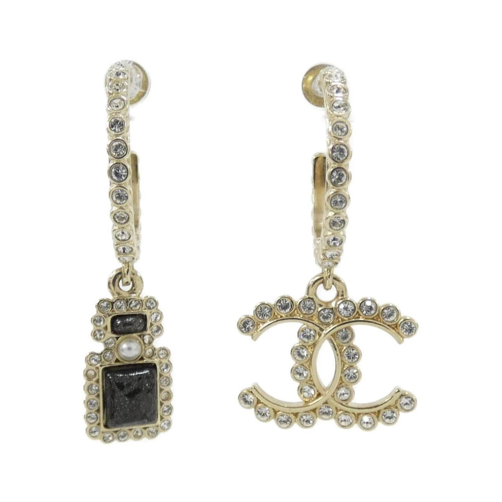 Hoop Earrings by Chanel: Hoop Earrings by Chanel Black and White Crystal Hoop Earrings by Chanel, featuring a sleek design with crystal accents. Made from high-quality materials, these earrings showcase a classic style that e