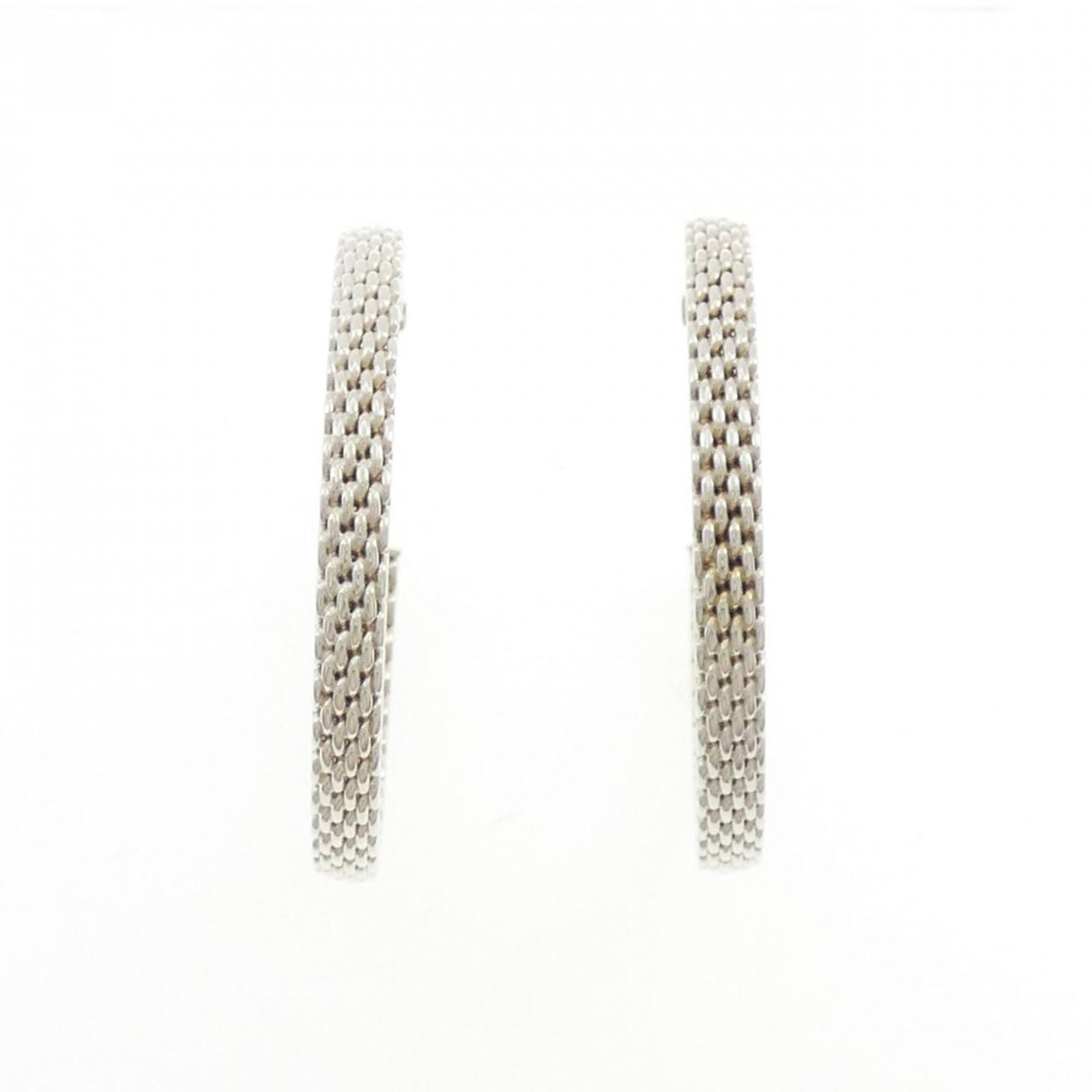 Silver earrings ring Tiffany: Silver earrings ring Tiffany Silver earrings ring Tiffany. Made from high-quality silver 925, these elegant earrings boast a classic design with a subtle shine. With their understated elegance and bar