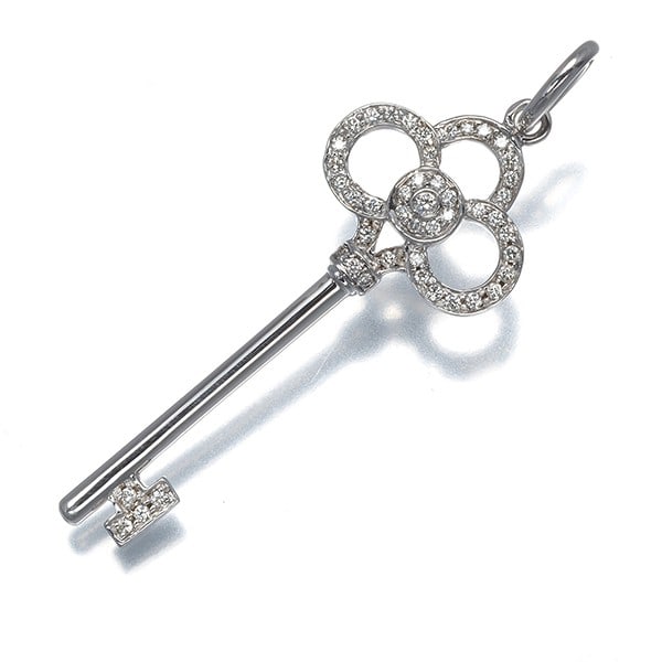 Tiffany&Co. Pendant Diamond Tiffany Keys Crown Key Charm 18K Wg: Tiffany&Co. Pendant Diamond Tiffany Keys Crown Key Charm 18K Wg 18k White Gold Tiffany & Co. Pendant Diamond Key Charm - A stunning piece featuring a natural diamond set within the iconic Tiffany Keys