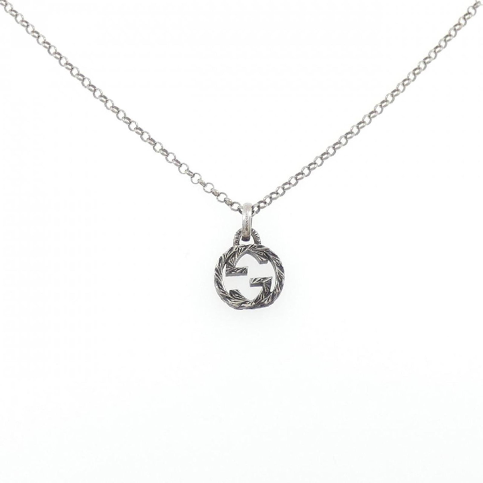 Interlocking G Necklace: Interlocking G Necklace Made from high-quality silver, this Gucci interlocking G necklace features an elegant pendant design. The 20.6mm x 13mm pendant size and 2.2mm width add a touch of