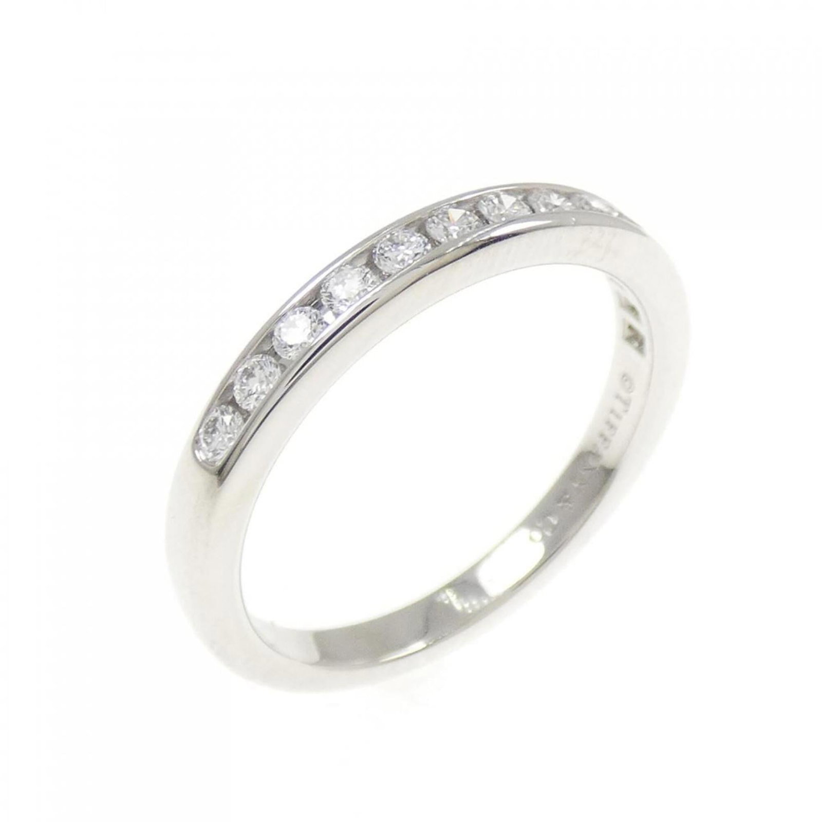 Platinum ring by Tiffany band: Platinum ring by Tiffany band Platinum ring by Tiffany & Co. boasts a sleek design, featuring a diamond stone set in a high-quality platinum band. The ring is made from 950 platinum and falls within